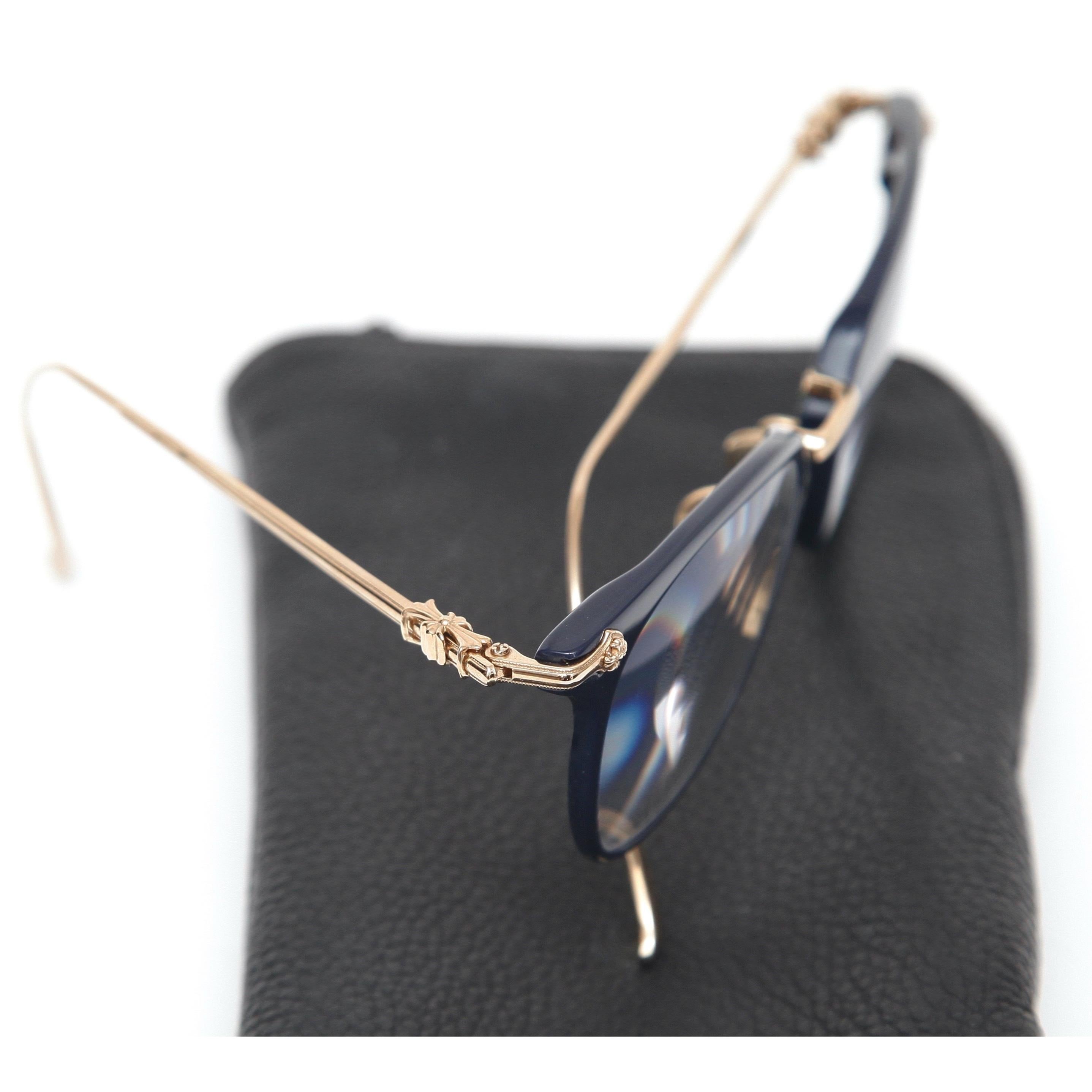 GUARANTEED AUTHENTIC CHROME HEARTS BLUE SHAGASS FRAME EYEGLASSES

Details: 
- Shiny navy blue acetate frames.
- Gold metal arms.
- Signature hardware at temples.
- Lens width: 51 mm.
- Bridge: 21 mm.
- Arm: 145 mm.
- Comes with Chrome Hearts soft