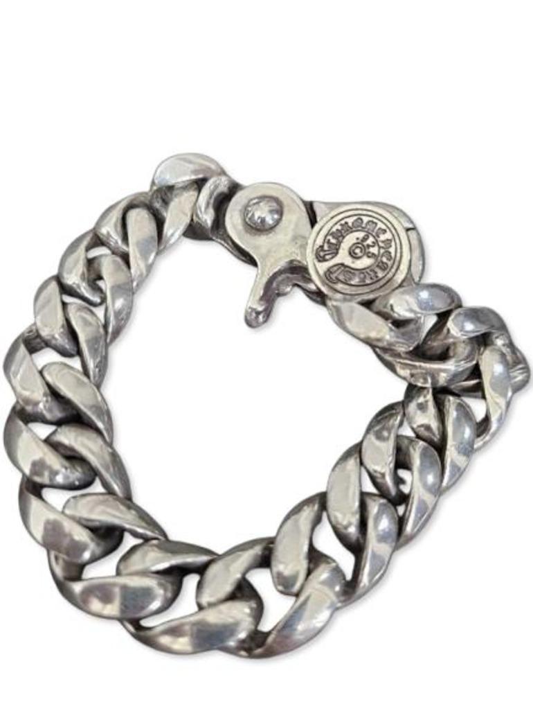 Elevate your accessory game with this stunning pre-owned Chrome Hearts silver chain bracelet, designed specifically for men. Crafted from high-quality silver, this heavy chain bracelet features a secure metal clasp, ensuring both style and