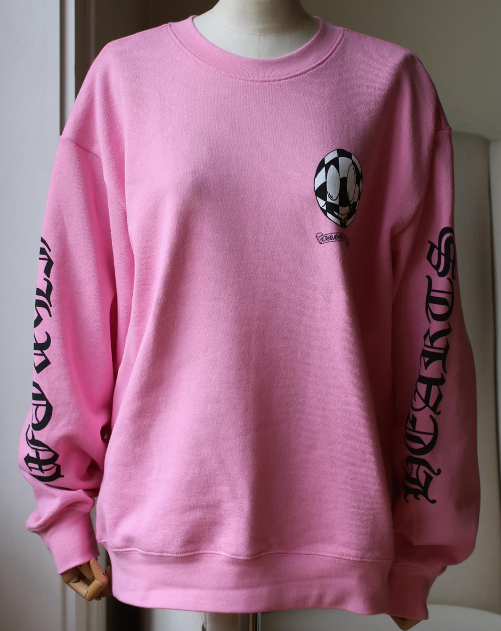 Long sleeve cotton jersey sweatshirt in pink by Chrome Hearts + Matty Boy. 
Logo printed in black and white. 
Printed detail on the back. 
Dropped shoulders.  
Rib knit collar, cuffs and hem. 
Colour: pink. 
100% Cotton. 

Size: Large (UK 12, US 8,
