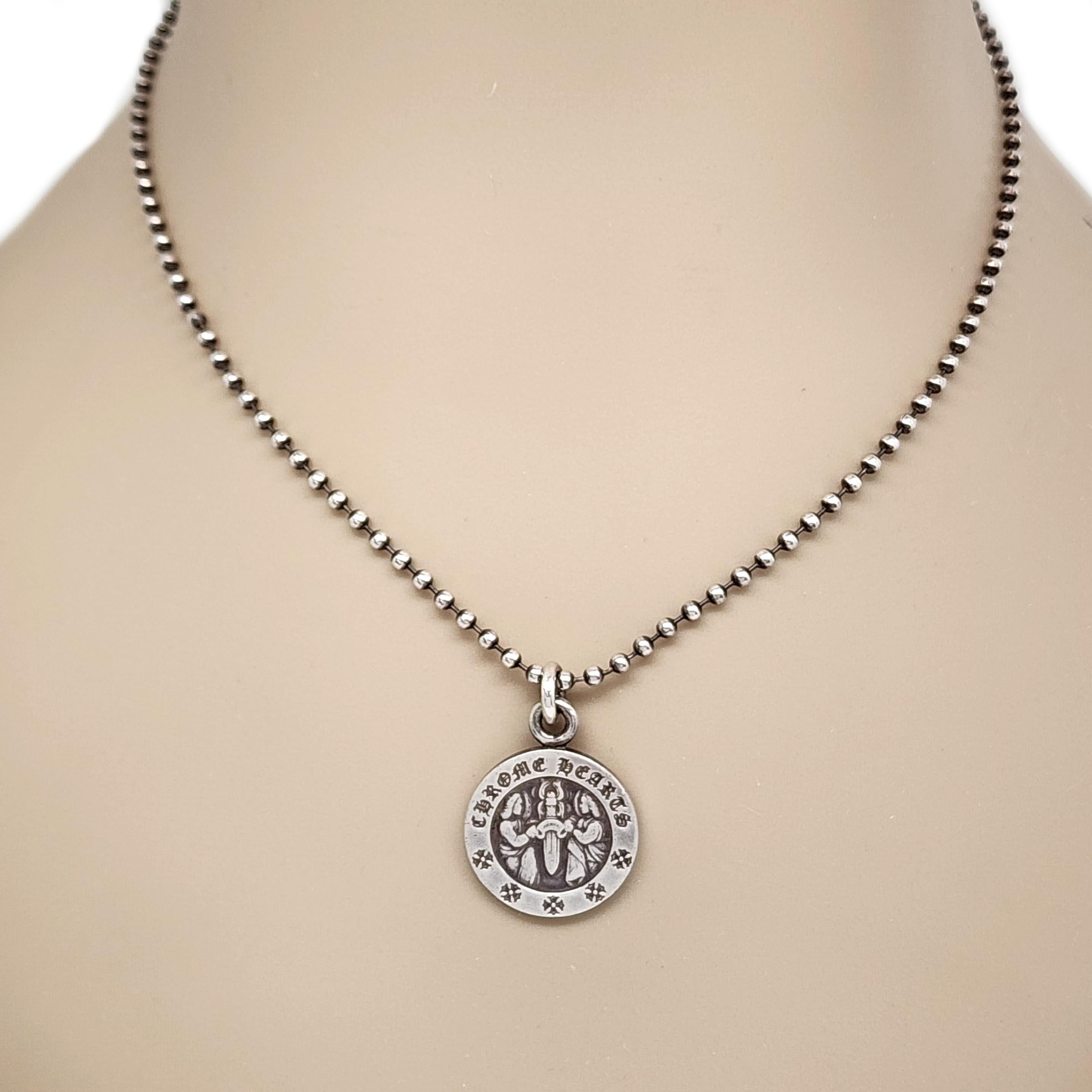 Sterling silver Angel medallion with beaded ball chain by Chrome Hearts.

Chrome Hearts double sided round medallion features 