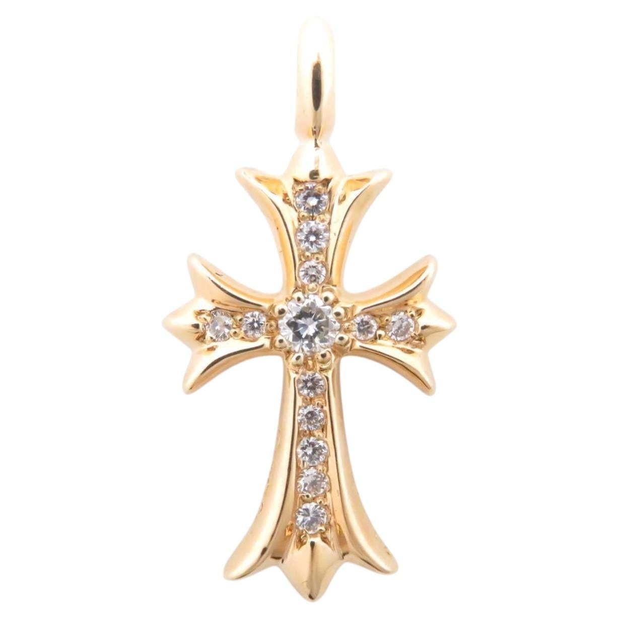 What does the Chrome Hearts cross represent?