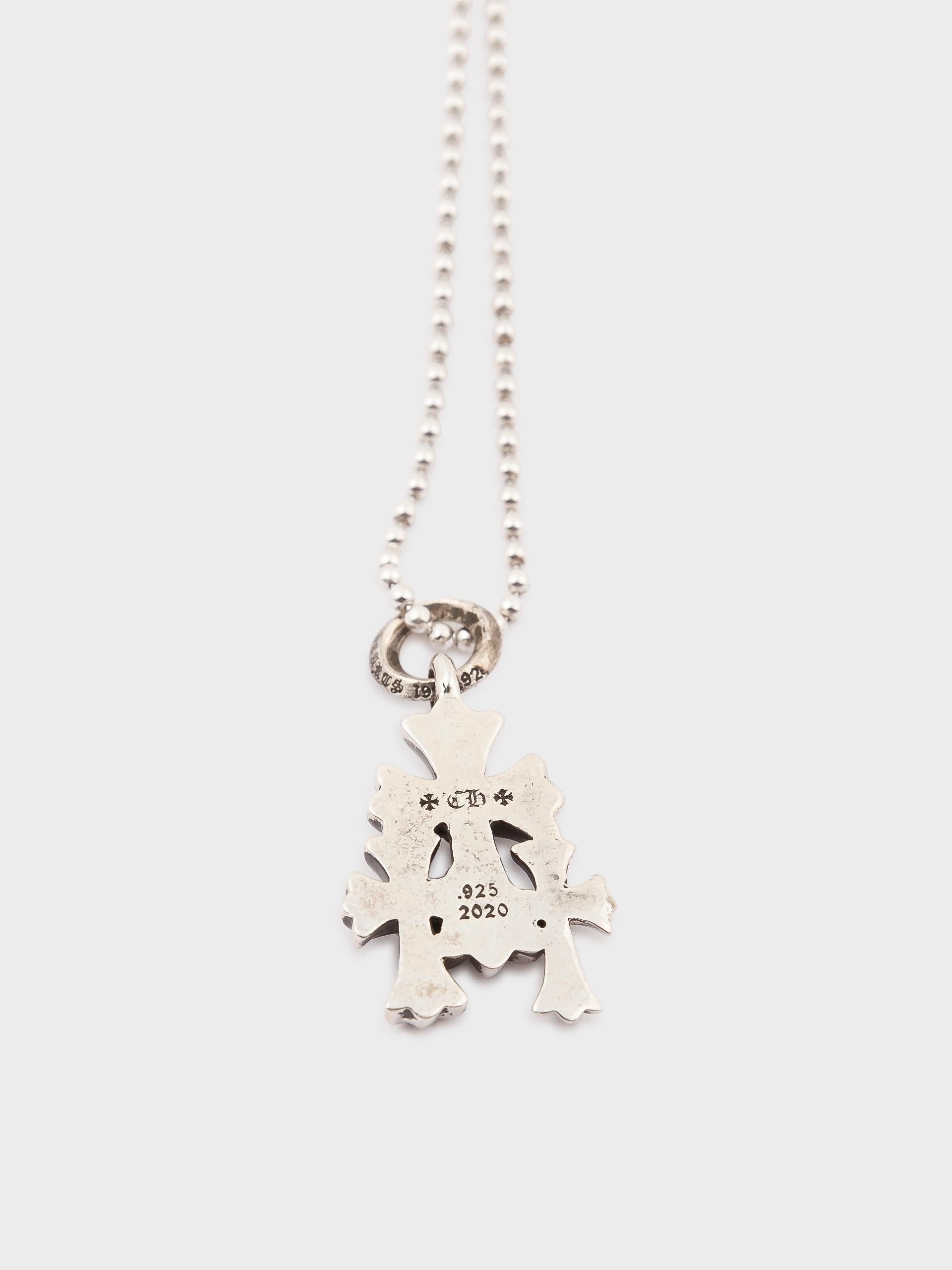 ✓ Authenticated

Our trained in-house authentication experts have reviewed this item to ensure that it is original. We guarantee its authenticity.

Here is a gently used Triple Cross Necklace from Chrome Hearts.

Condition: Like new 

