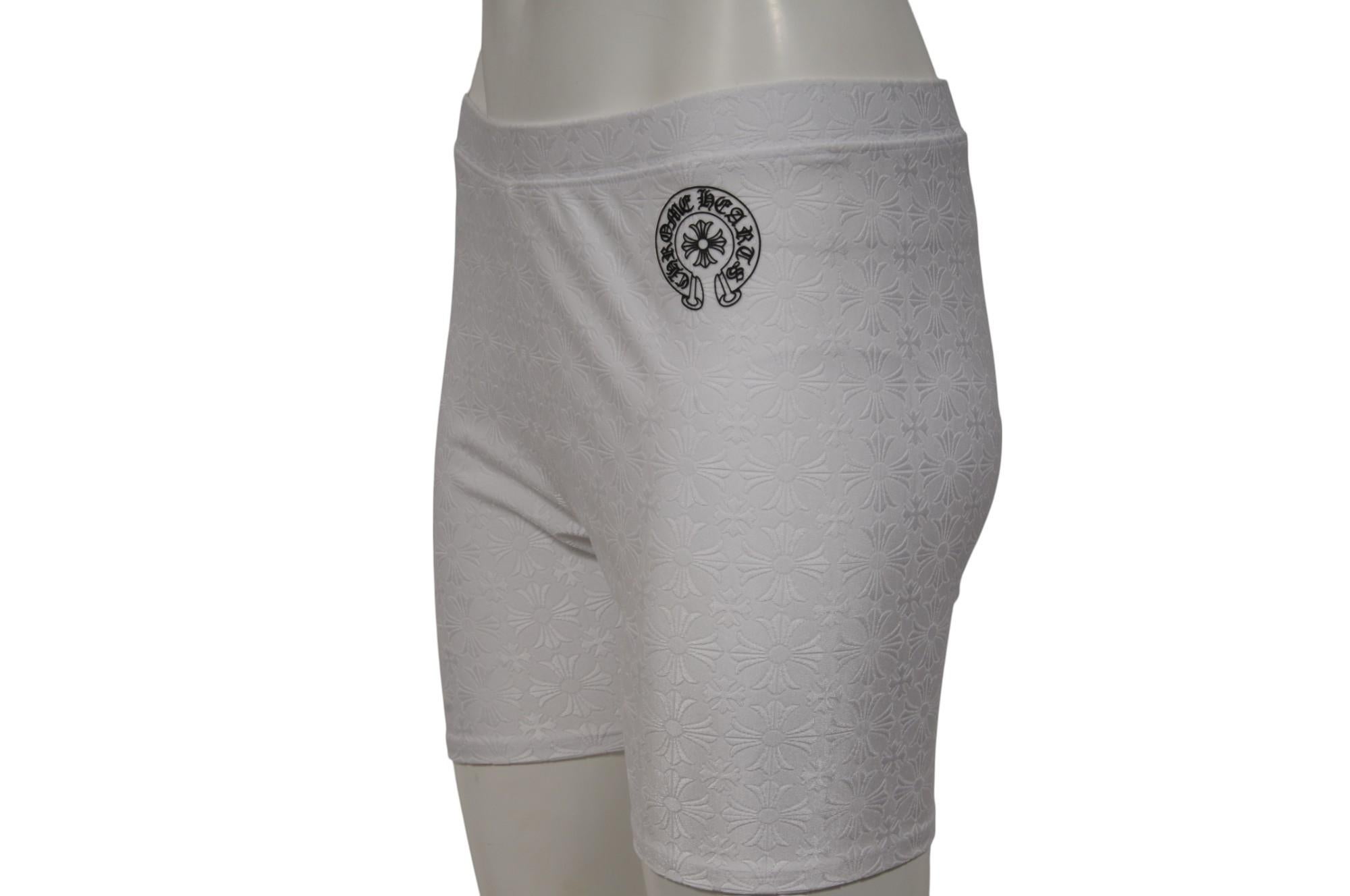 - White exterior

- Tagged size L

- Made of 27% polyamide 73% polyurethane



Condition: 

New Without Tags



Measurements: ( Approximately In Inches ) 

Waist: 15-18

Inseam: 4.5

Rise: 12.5

Leg Opening:  8