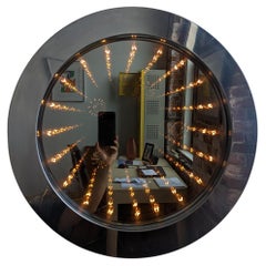 Specchio Infinity cromato di Curtis Jere, firmato