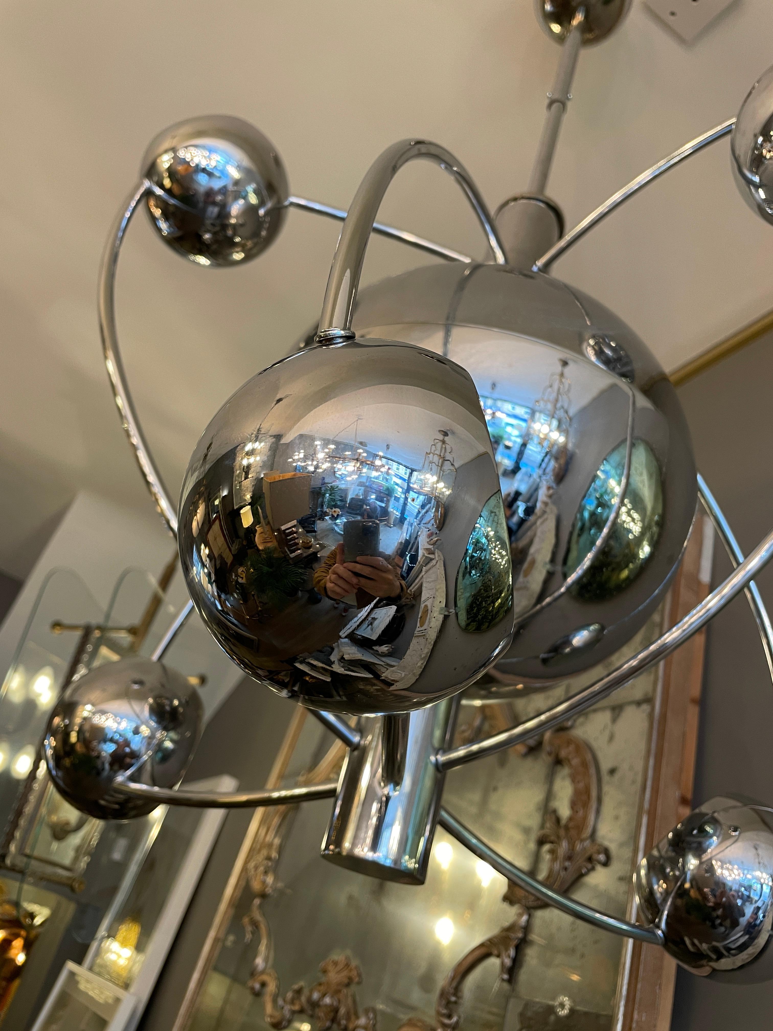 A six light satellite chrome chandelier by Goffredo Reggiani. Six round directional shades orbiting the central sphere. Italian circa 1960 . Re wired with new fittings as seen in slider images.