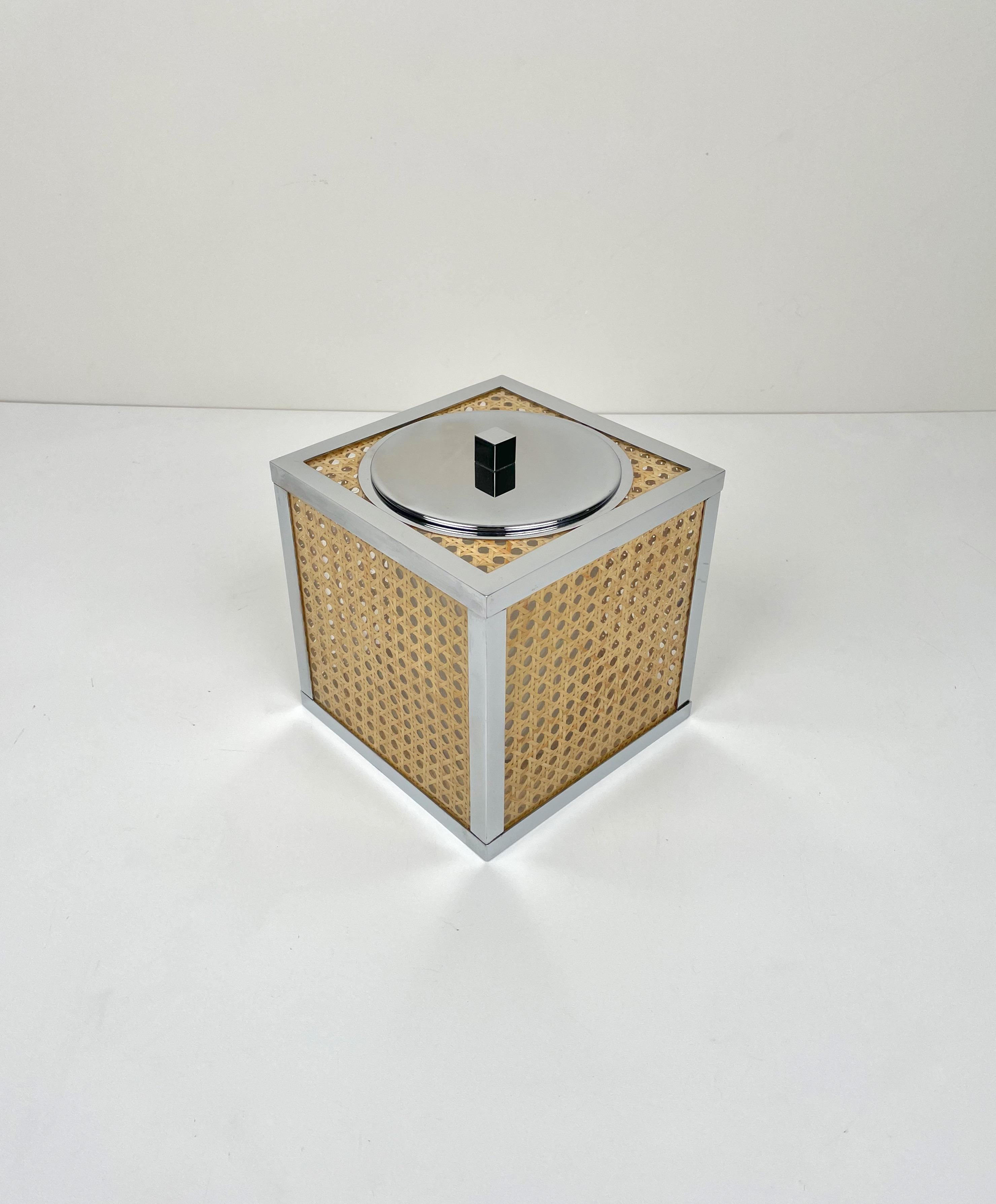 Barware rectangular ice bucket in lucite and wicker with chrome frame and top in the style of Christian Dior. Made in France in the 1970s.