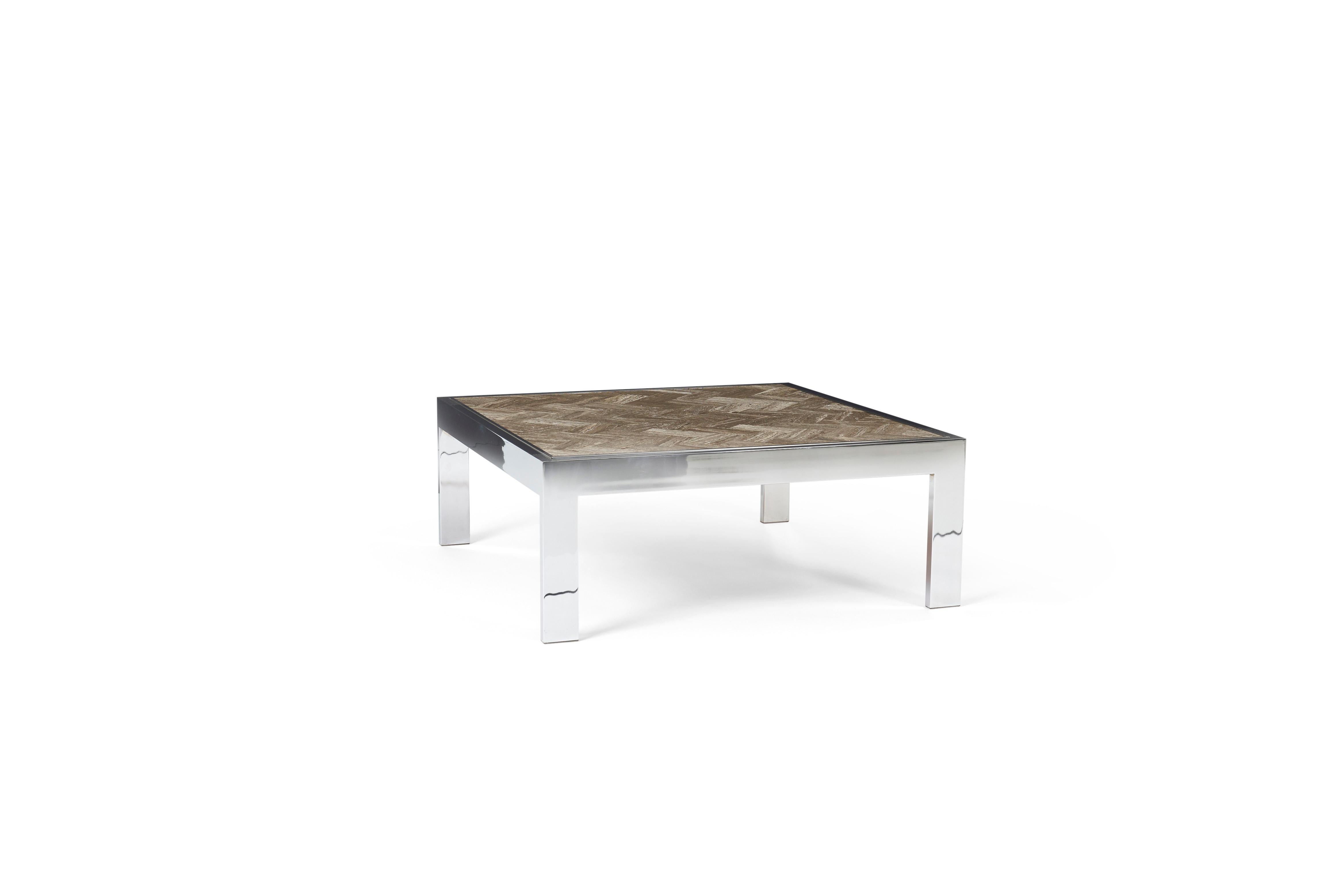 Chrome frame cocktail table with tessellated marble top. Designed by Leon Rosen for Pace.