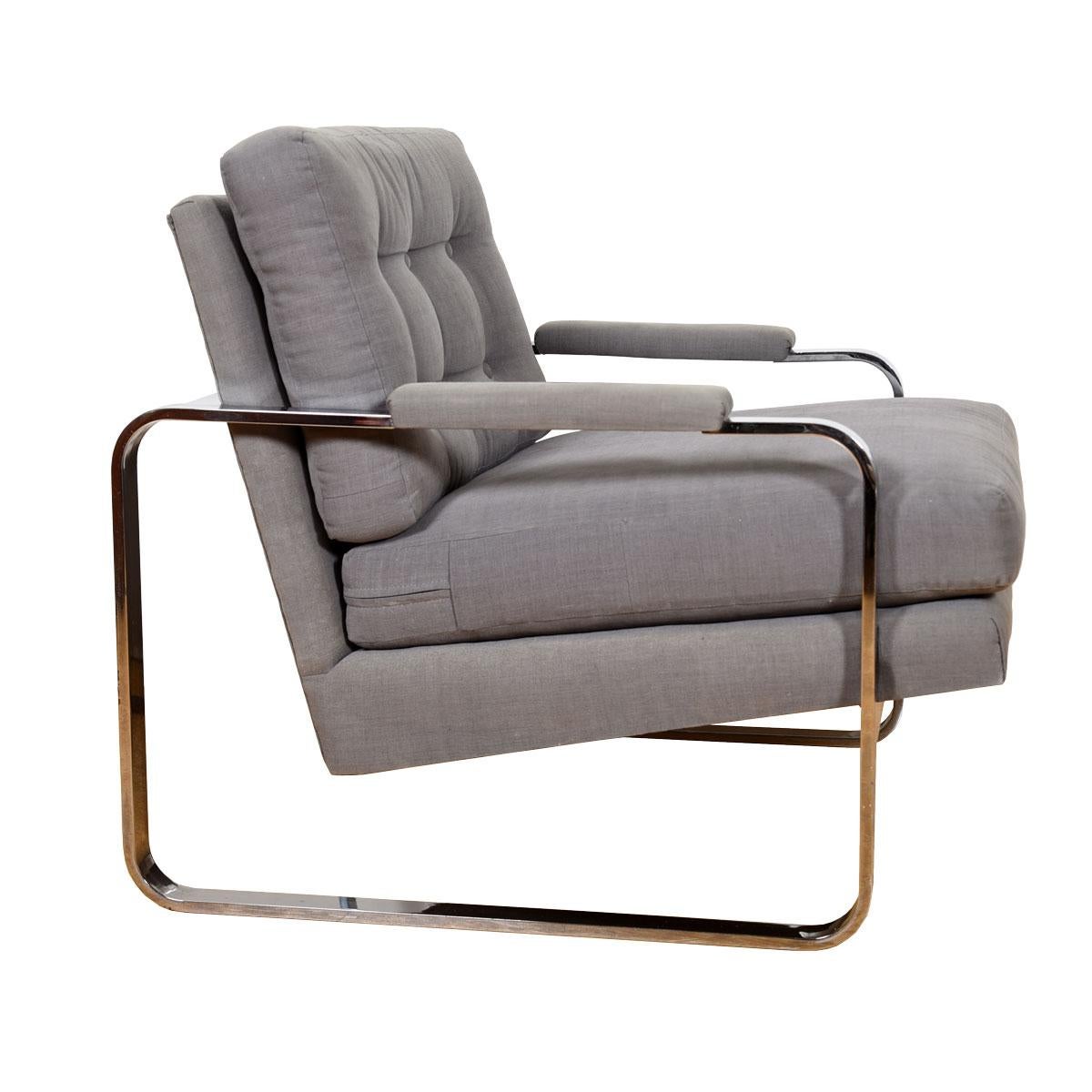Handsome upholstered lounge chrome chair with upholstered seats, attributed to Milo Baughman for Thayer Coggin.
Into an open cube frame of chrome a fully upholstered back and seat have been placed at a slight angle for a dynamic look, as well as