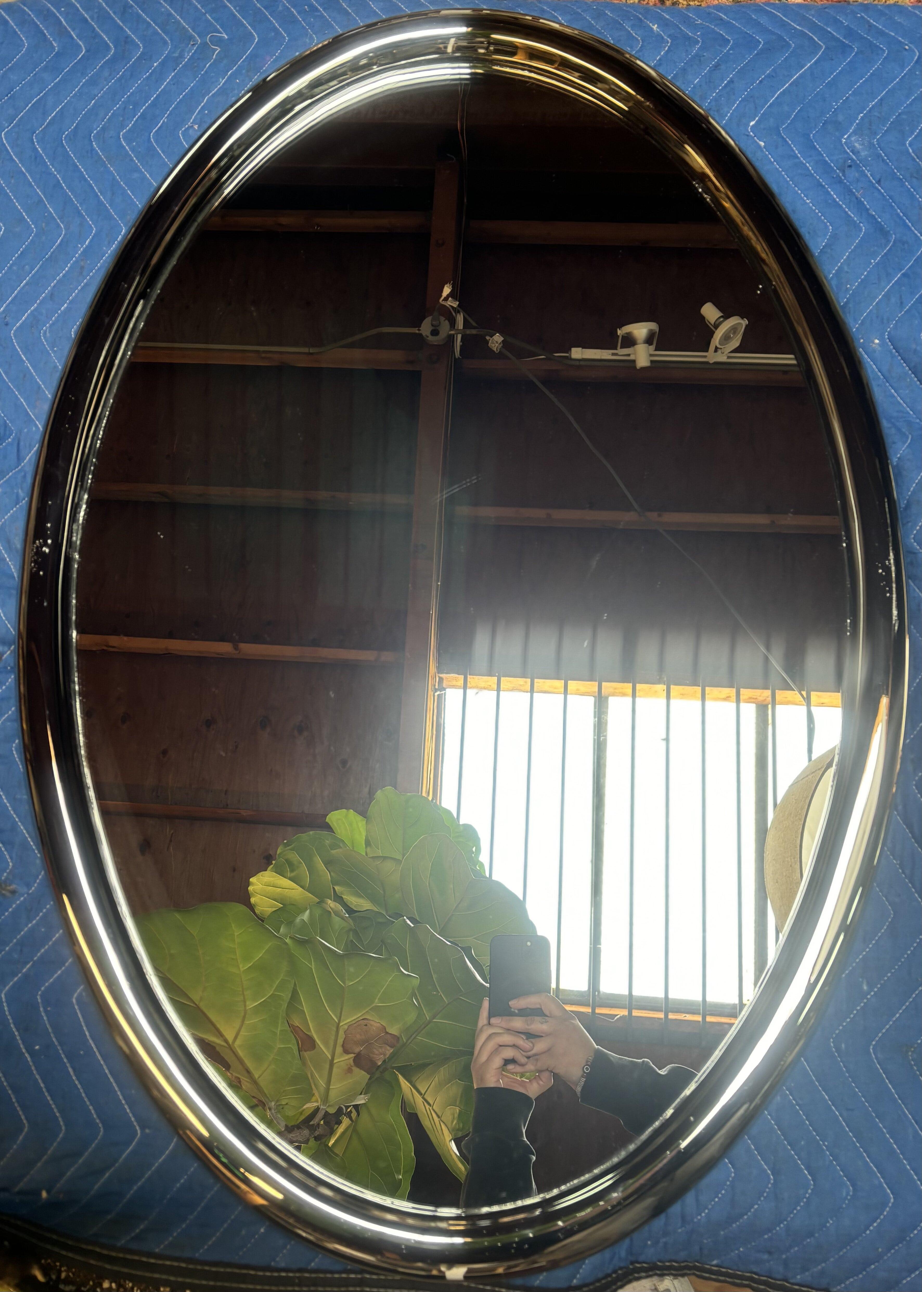 Futurist Chrome Oval Mirror For Sale