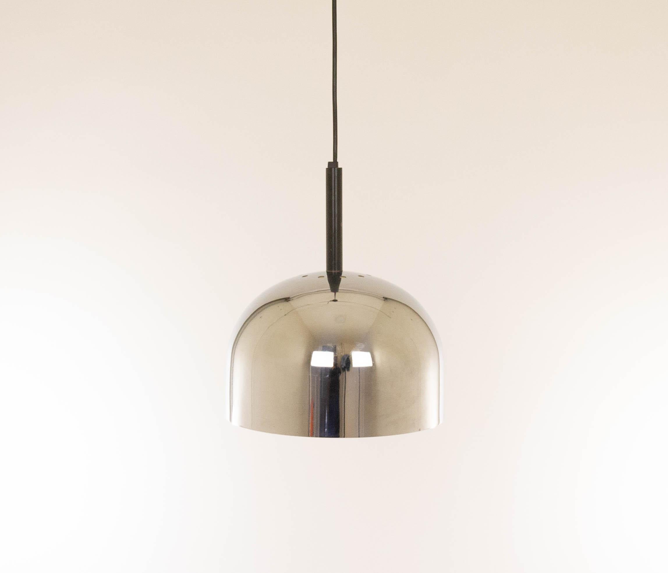 Chrome pendant No. 6505 designed by Gae Aulenti and Livio Castiglioni and produced by Stilnovo Milano in the 1970s.

The condition of this pendant is very good. The diameter of the lamp is 32 cm / 13 inches.

Two pendants available; the price is per