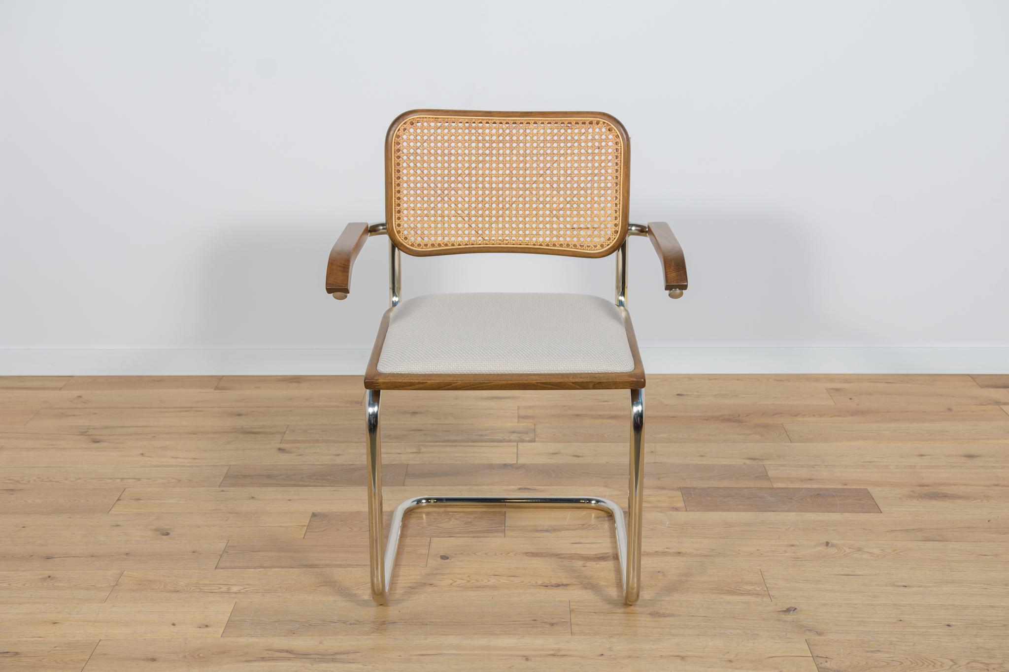 Cesca-type armchair, modeled on Marcel Breuer's design from 1928. Produced in the 1980s. The chrome-plated frame is in very good original condition, has been cleaned and polished. The joinery has been professionally renovated, the beech wood has