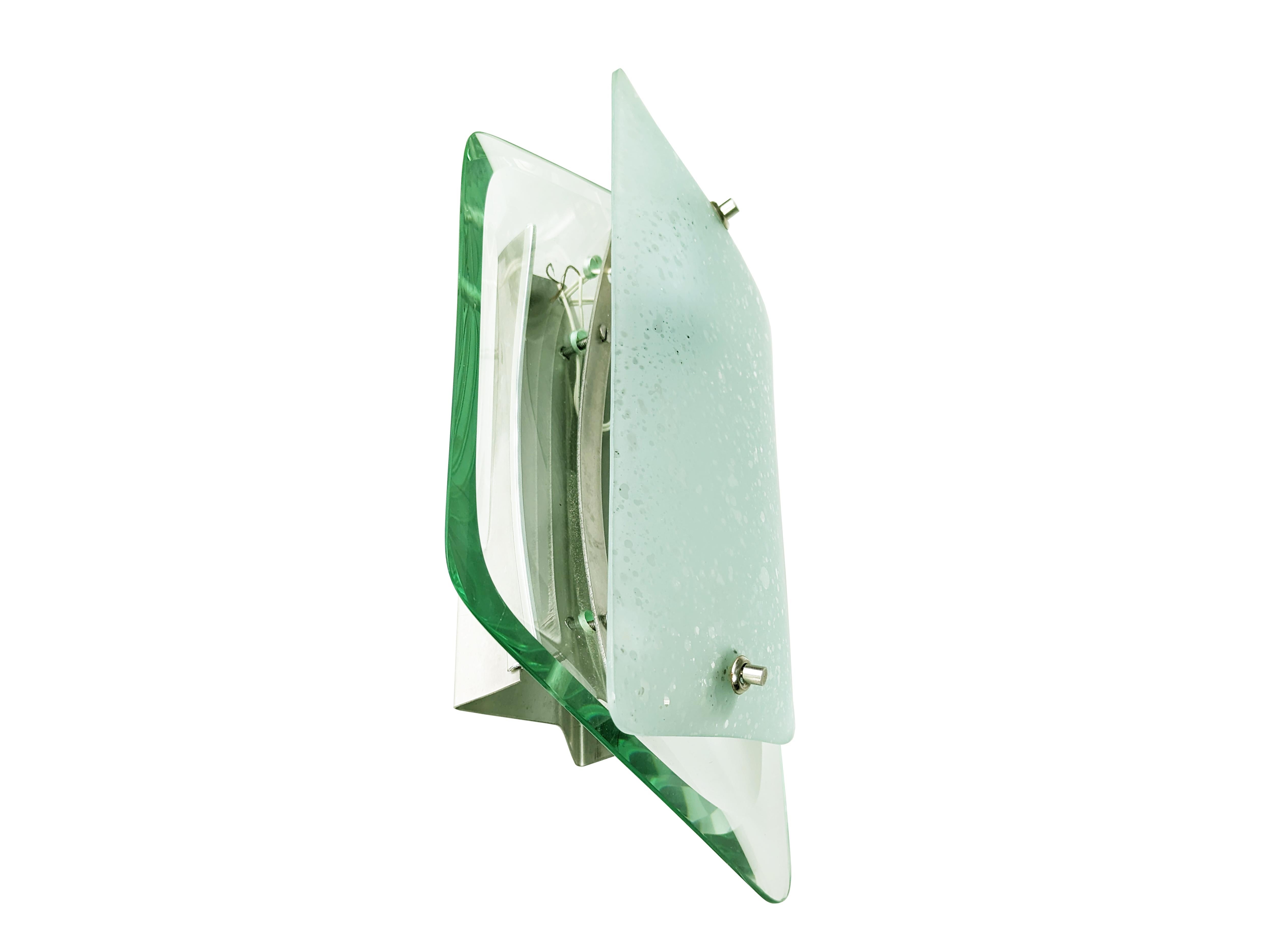 Wall light in chrome platedd metal, curved, sandblasted and ground glass made in the 1960s in the style of Fontana Arte. Brand new condition. The lamp is equipped with E14 lamp socket.