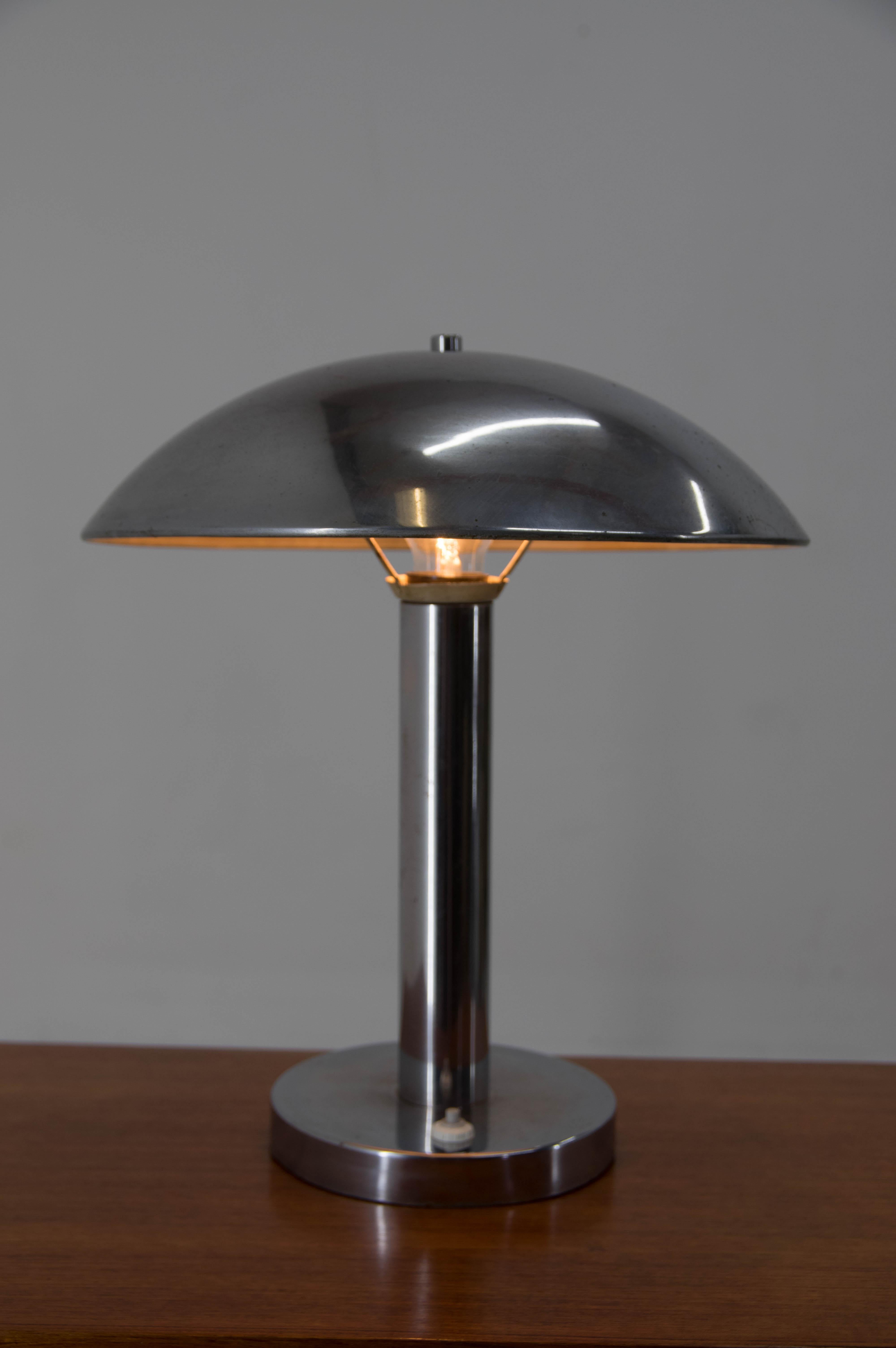 Chrome-plated table lamp by Napako
Chrome with age patina
40W, E25- E27 bulb
Including US plug adapter.