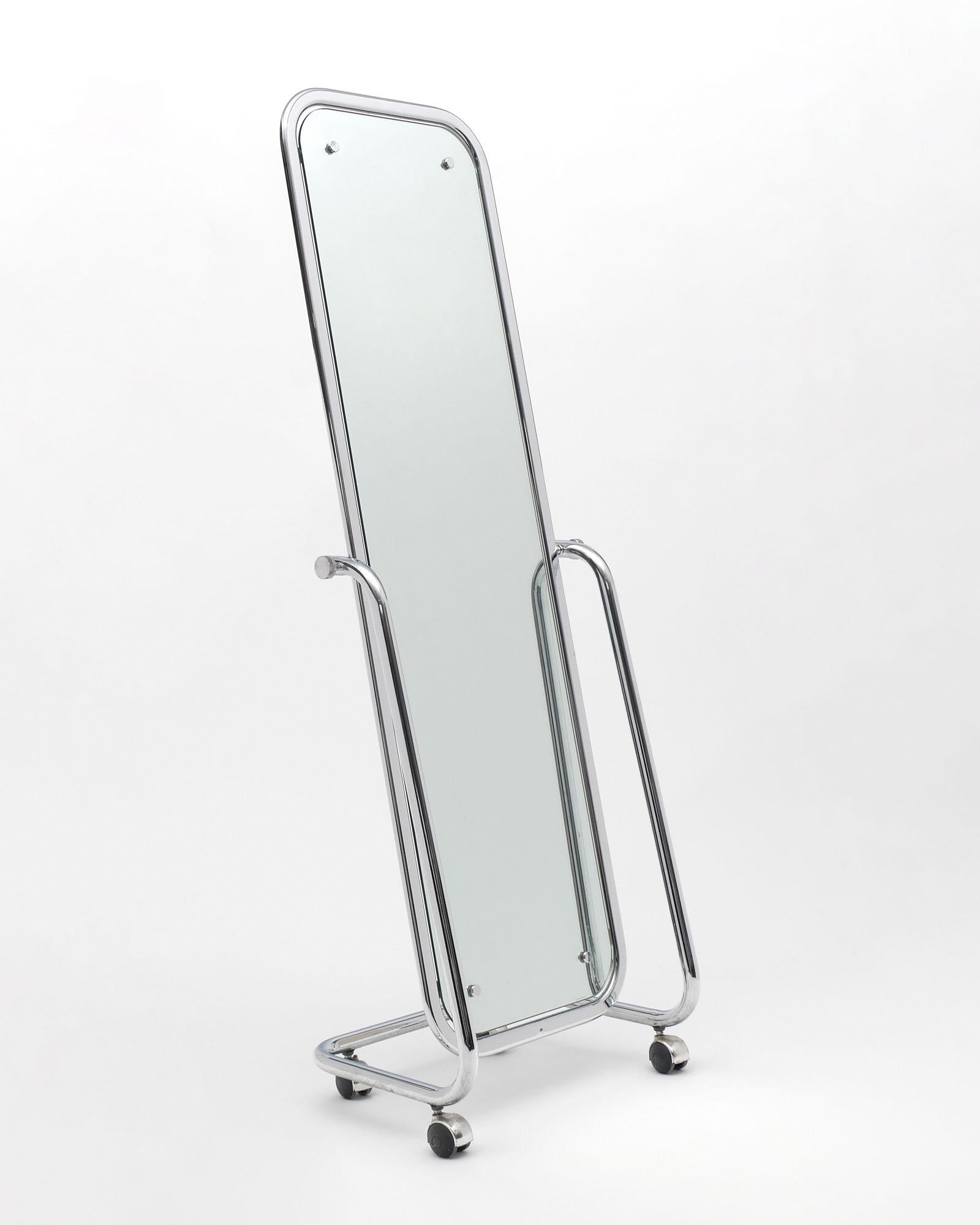 Psyche mirror from Italy. This piece has an oblong chromed steel structure articulated on 4 casters.