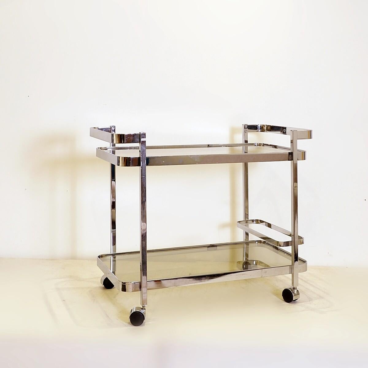 Mid-Century Modern Chrome rolling trolley with smoked glass tops, 70s, with bottle holder For Sale