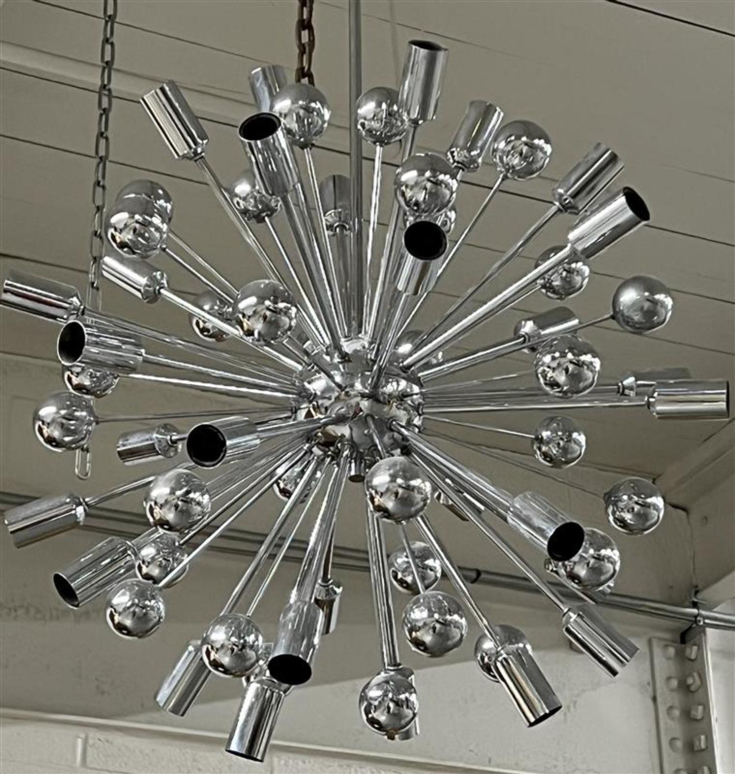 Vintage original Italian mid-century Sputnik chandelier
 All chrome structure. 24 bulbs
Space age style
Rewiring recommended 
Pair Available 