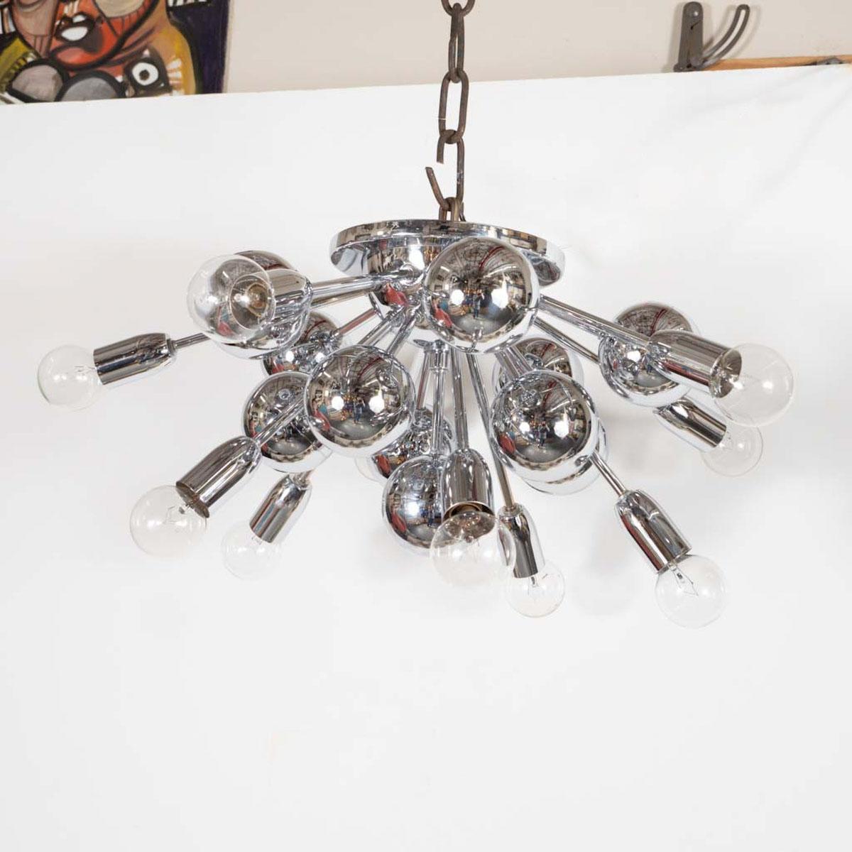 Chrome sputnik style flush mount fixture with rays terminating in spheres. Light bulbs are not included.