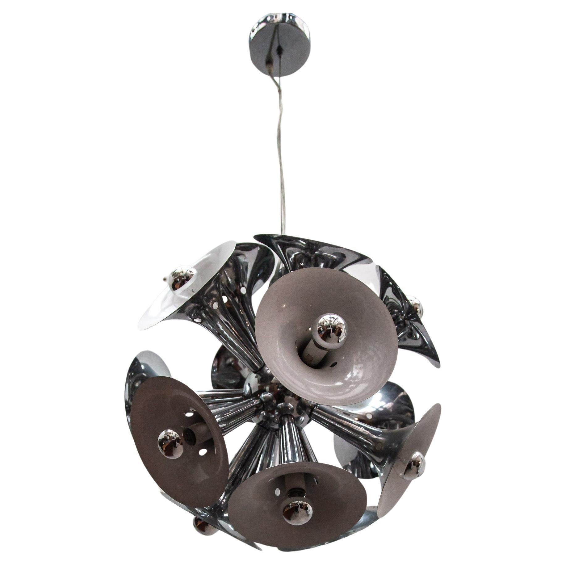 Beautiful large Sputnik trumpet chandelier model Dendiolon, extending from the center sphere with fifteen sockets are mounted at trumpet-shaped shades they create a perfectly gorgeous sphere that illuminates your interior in Spage age style.
 
