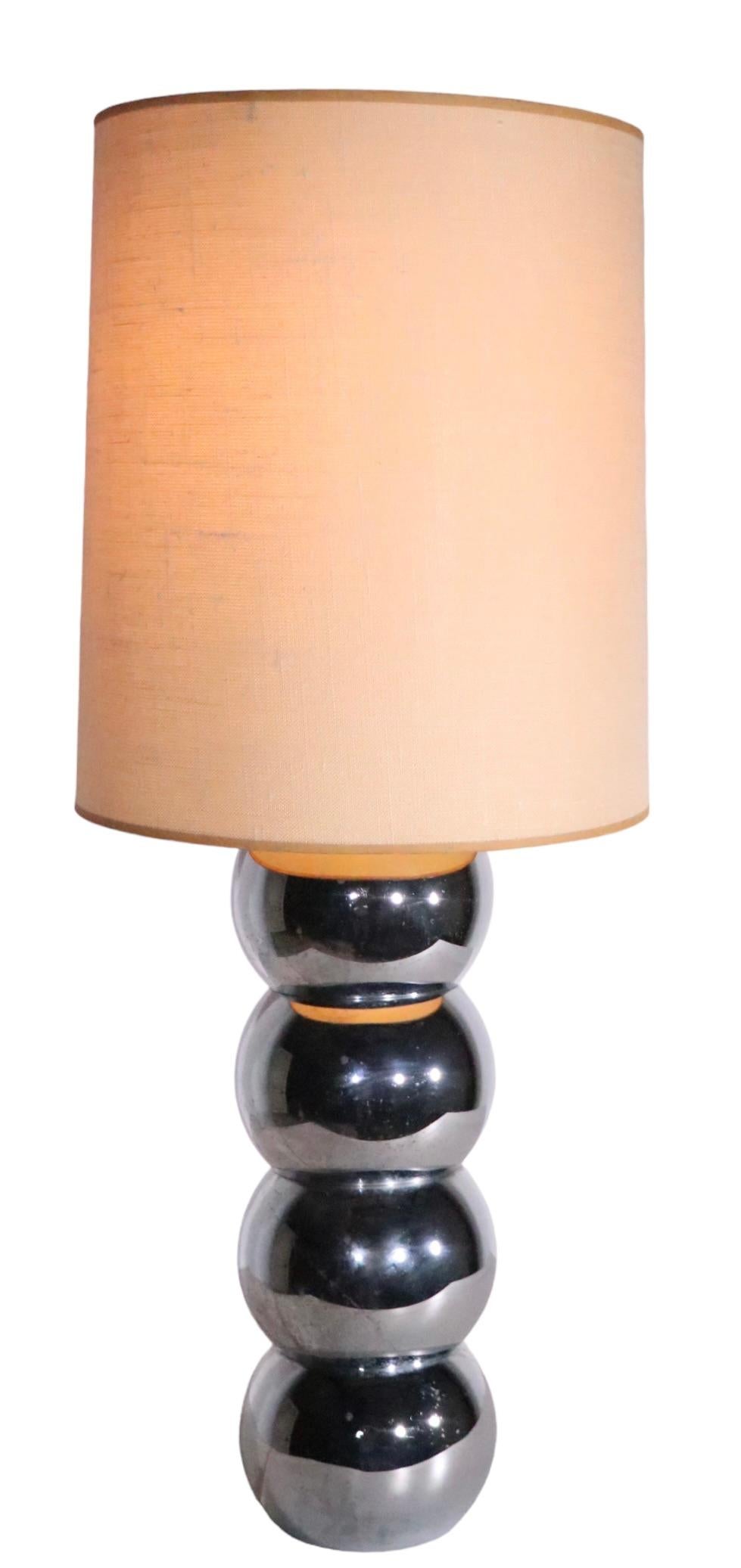 Classic chrome  stacked ball table lamp by George Kovacs, circa 1970's. This example is in very good original, clean and working condition, showing only light cosmetic wear, normal and consistent with age.
 Total H 32 x H to top of chrome balls 18 x