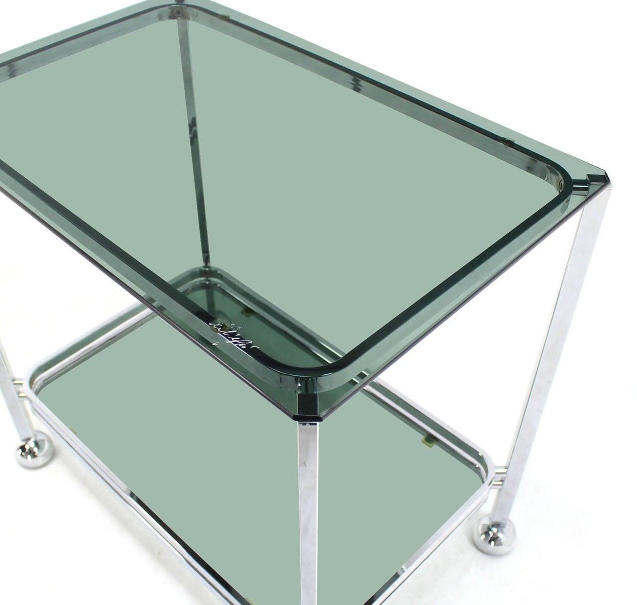 20th Century Chrome Tinted Smoked Glass Rolling Tea Cart with Concealed Wheels For Sale