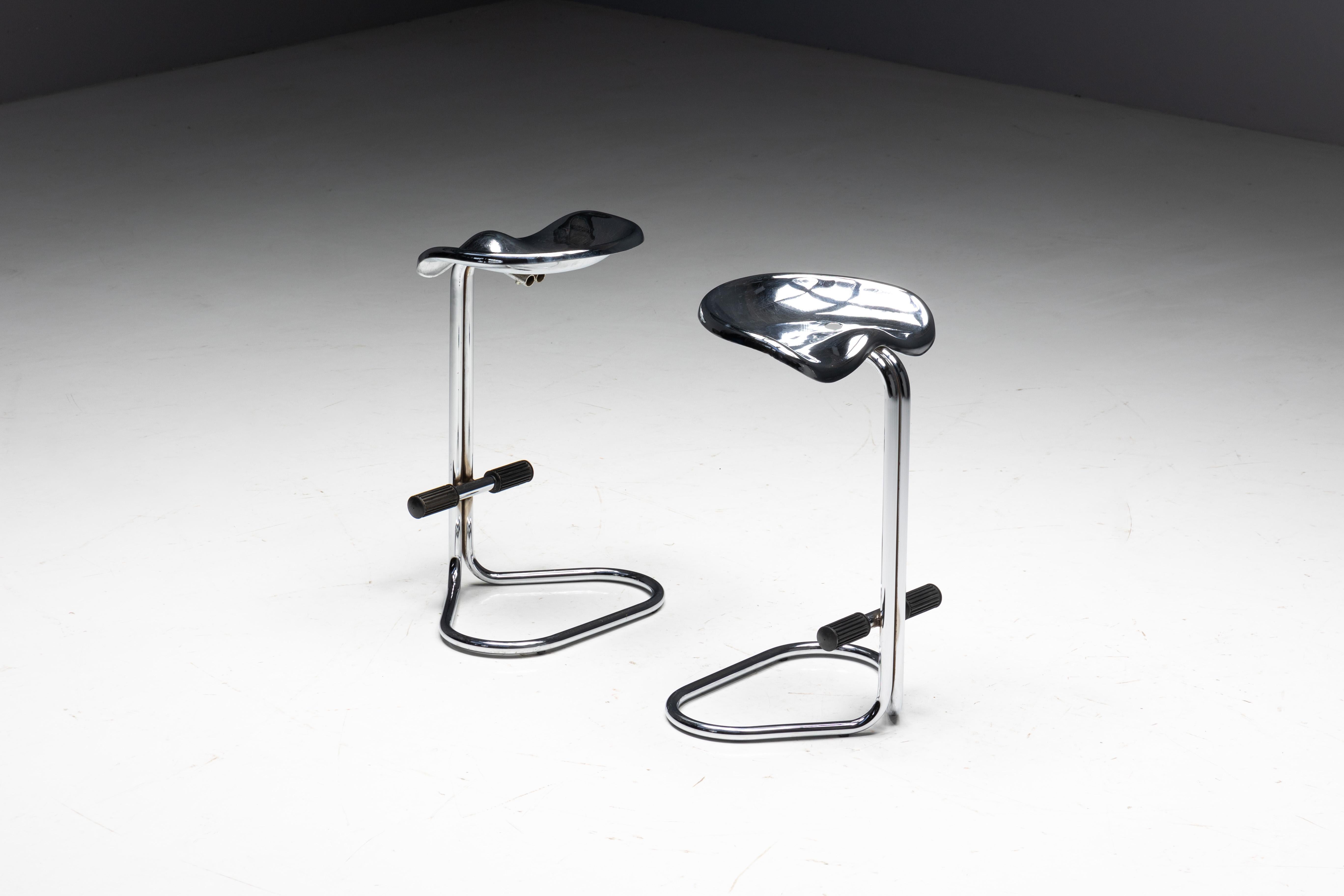 Chrome tractor stools designed by Rodney Kinsman for Bieffeplast in 1968. Crafted with a tubular chromed steel base and adorned with a sleek chromed steel tractor seat, this stool exudes both fun and exclusivity. Its enduring appeal and great