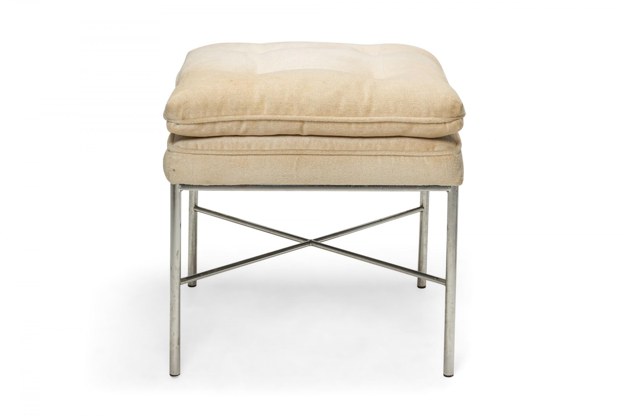 American Mid-Century square bench with a chrome tube frame with x-shaped stretcher topped with a double cushioned beige fabric upholstered seat. (manner of DESIGN INSTITUTE OF AMERICA).