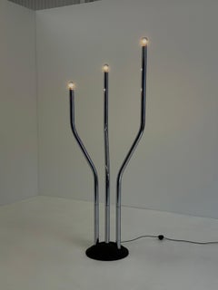 Chrome tubular frame designer floor lamp by Goffredo Reggiani