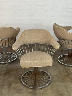 Chrome tulip base arm chairs - set of four