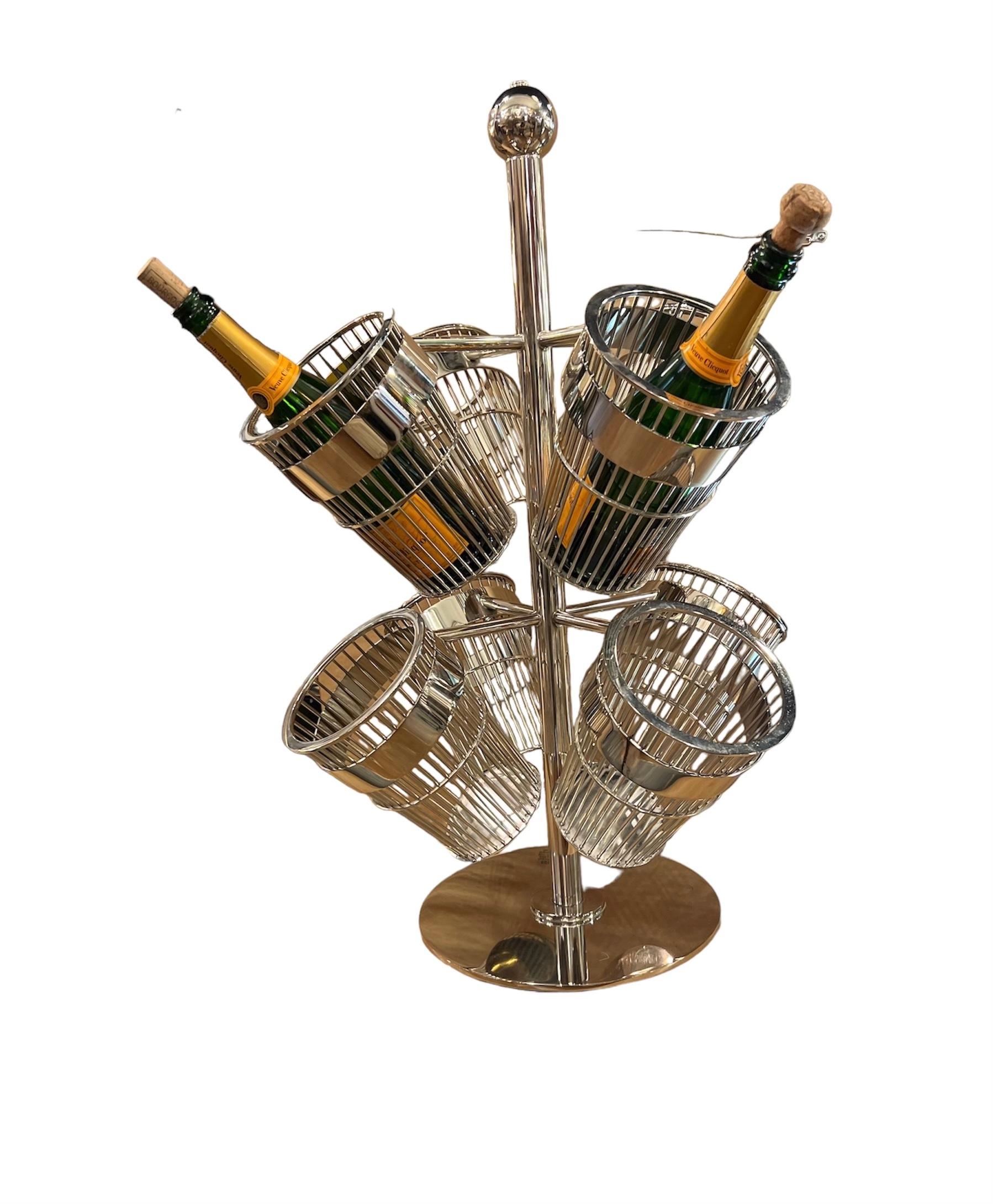 Step into the sleek sophistication of the 1990s with this striking Chrome Wire Basket Champagne Holders on Stand. Designed to elevate any social gathering, this piece seamlessly combines functionality with contemporary flair, making it a standout