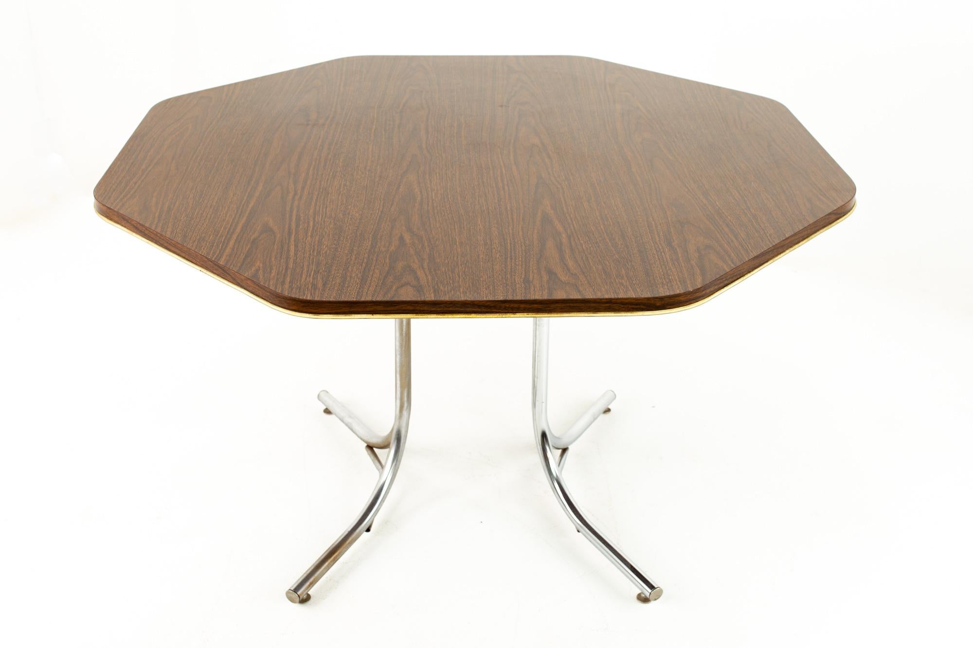 Chromecraft Mid Century octagonal Formica top table

Table measures: 47 wide x 29.5 deep x 47 high

This price includes getting this piece in what we call restored vintage condition. That means the piece is permanently fixed upon purchase so it’s