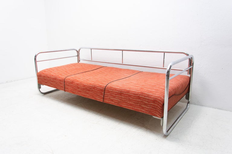 Chromed tubular steel sofa from the Bauhaus period, 1930s, Bohemia, Probably produced by Hynek Gottwald. Chrome is generally in good Vintage condition, shows slight signs of age and using.

Measures: Height: 67 cm

lenght: 192 cm

depth: 84