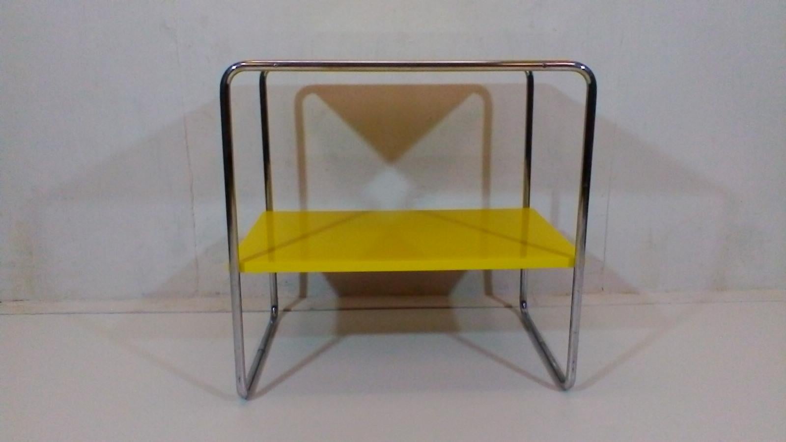 The item is from combination chrome and wood. Chrome is in original condition. Wooden surfaces of the table is painted with polyurethane hardened varnish in high gloss. Manufacture in Slezákovy závody Bystrice pod Hostynem, Czechoslovakia. Good
