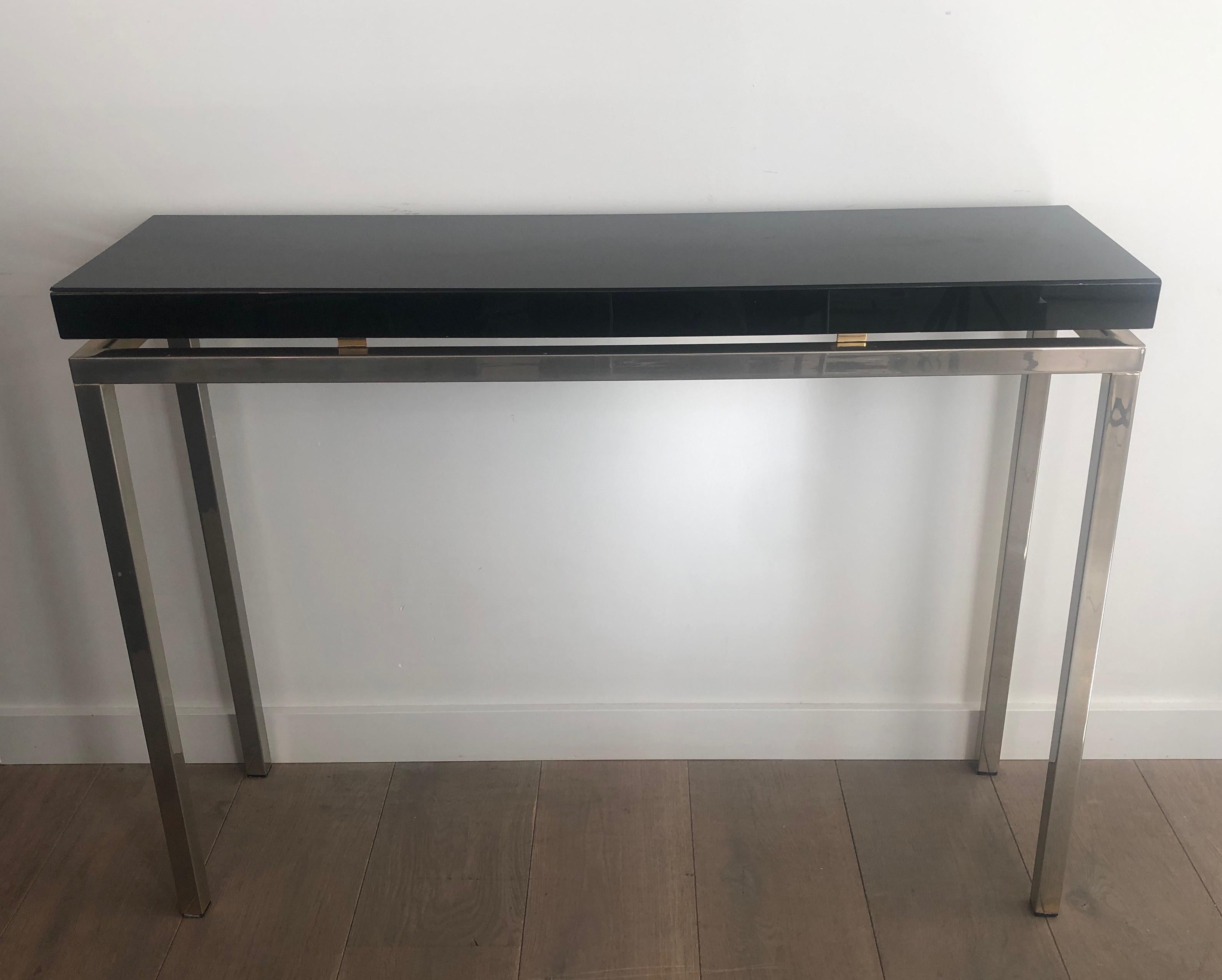 Chromed console with thick black lacquered top. French work. Circa 1970 For Sale 4