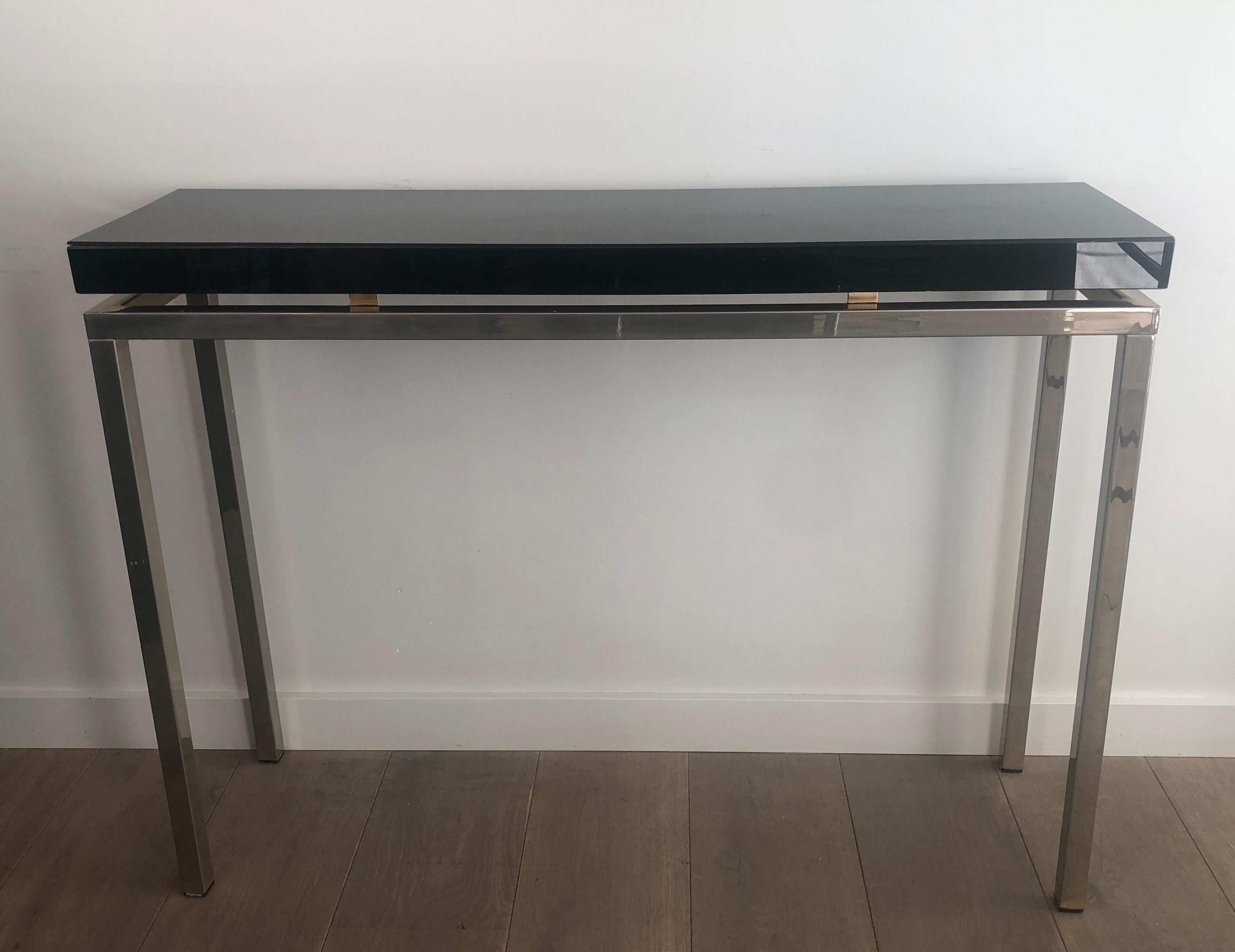 Chromed console with thick black lacquered top. French work. Circa 1970 For Sale 9