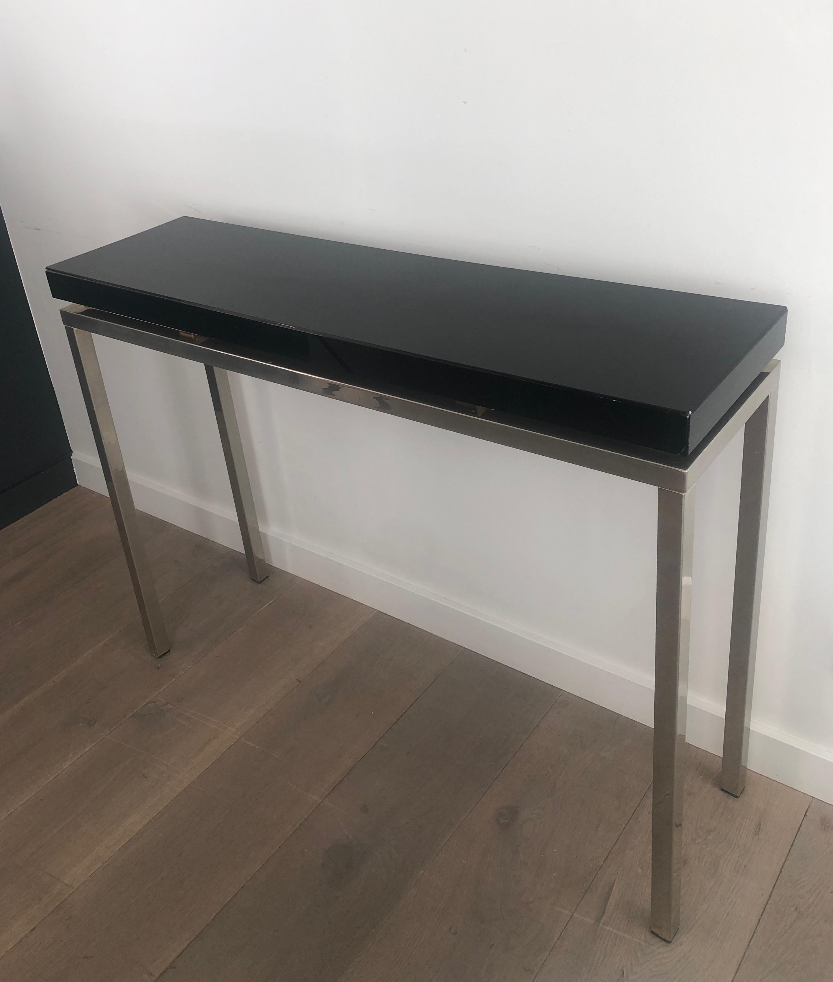 Chromed console with thick black lacquered top. French work. Circa 1970 For Sale 11