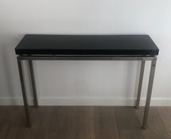 Chromed console with thick black lacquered top. French work. Circa 1970