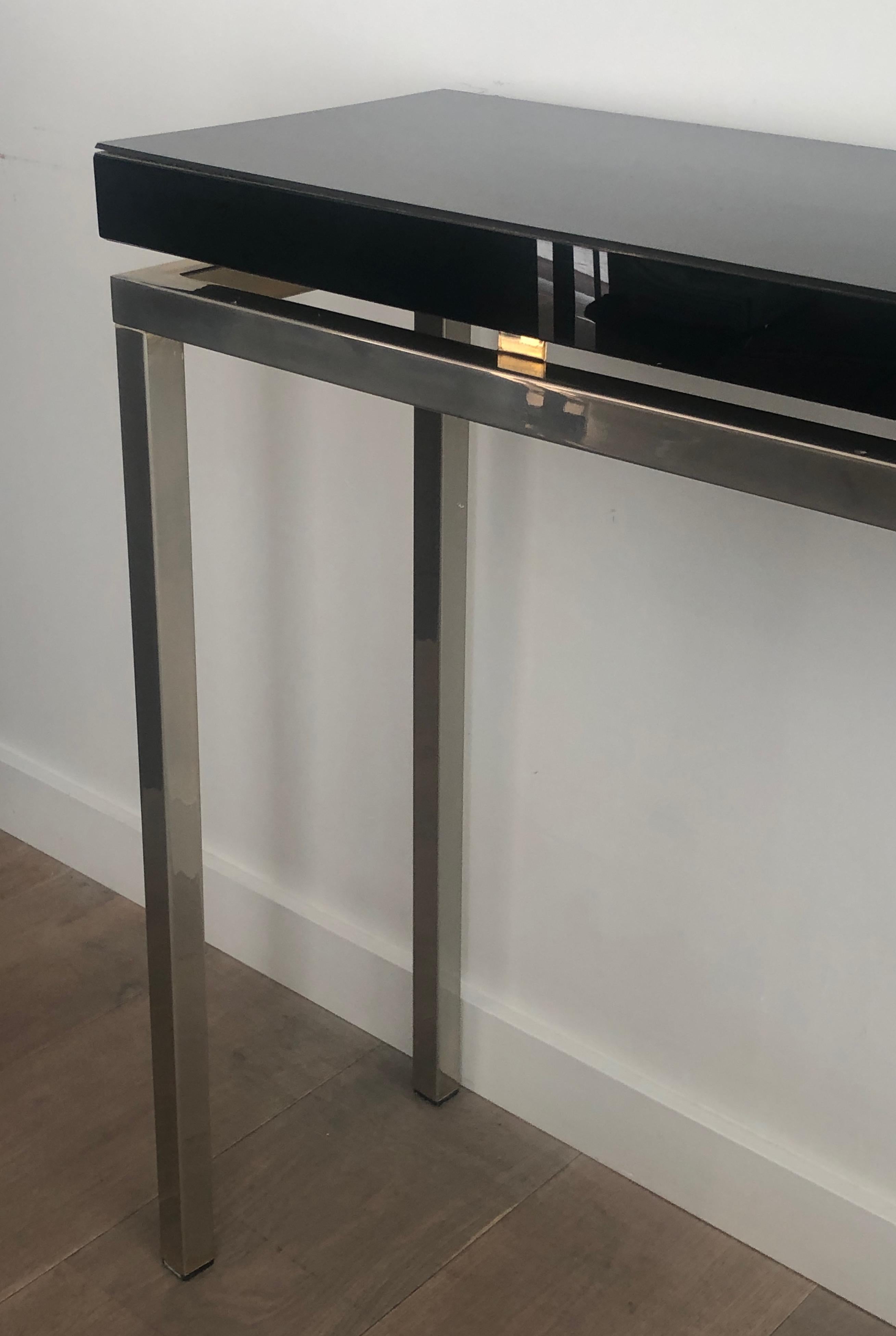 Chromed console with thick black lacquered top. French work. Circa 1970 For Sale 2
