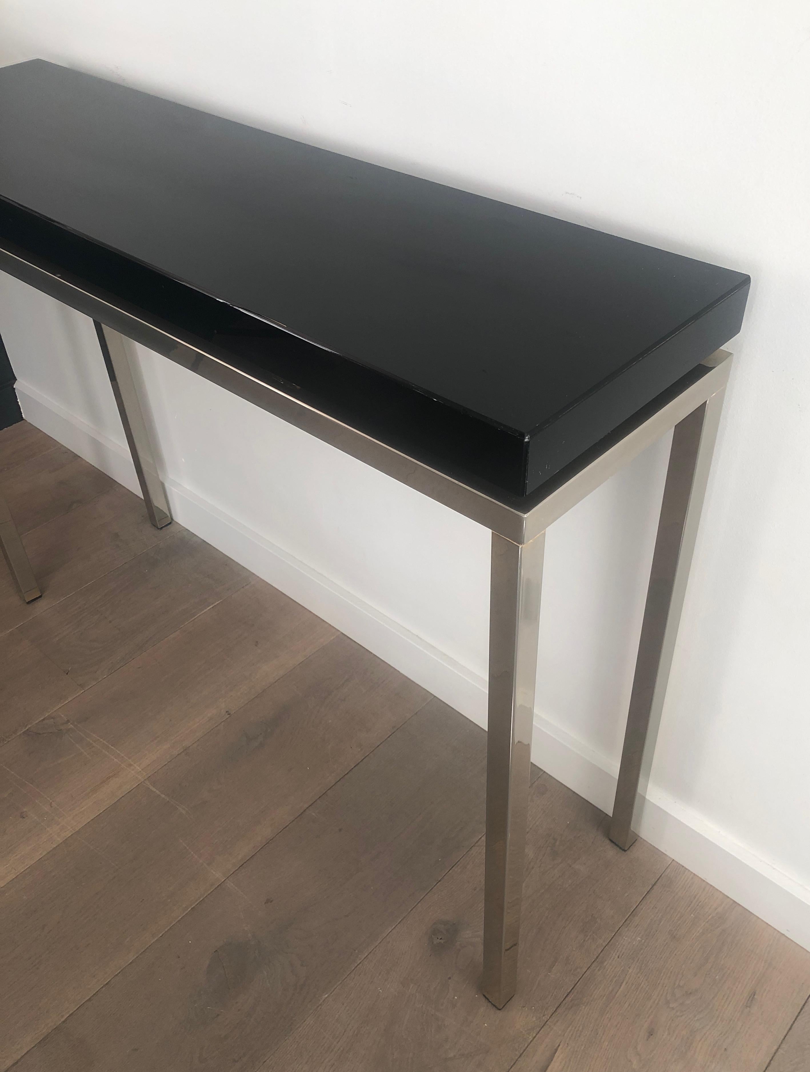 Chromed console with thick black lacquered top. French work. Circa 1970 For Sale 3