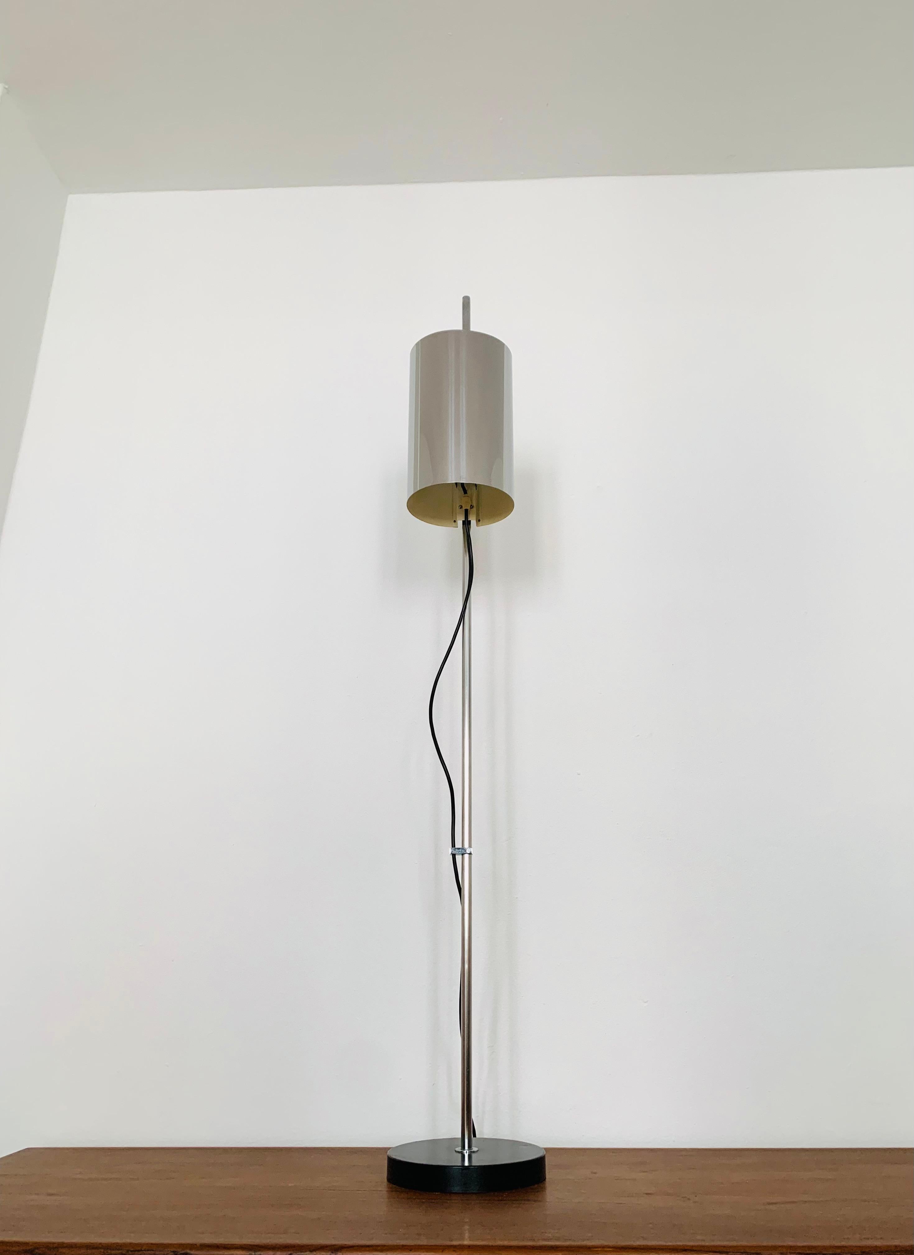 Dutch Chromed floor lamp by Raak For Sale