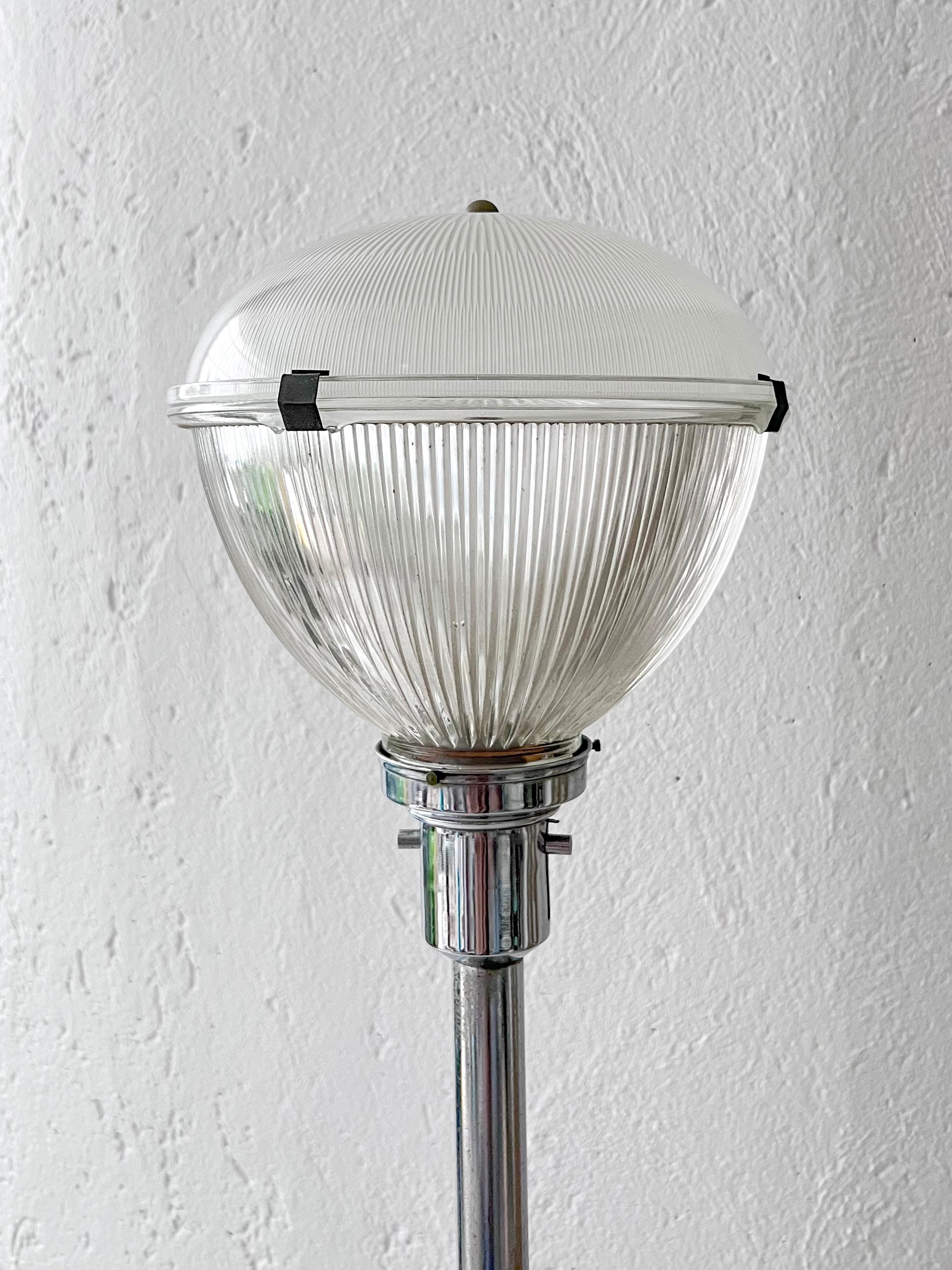 Mid-Century Modern Floor Lamp - Chromed Metal Lamp - Ignazio Gardella Style

Vintage Italian Mid-Century Modern floor lamp in chromed metal and glass. Timeless in style, the top glass element looks exactly the same as some lamps designed by Ignazio