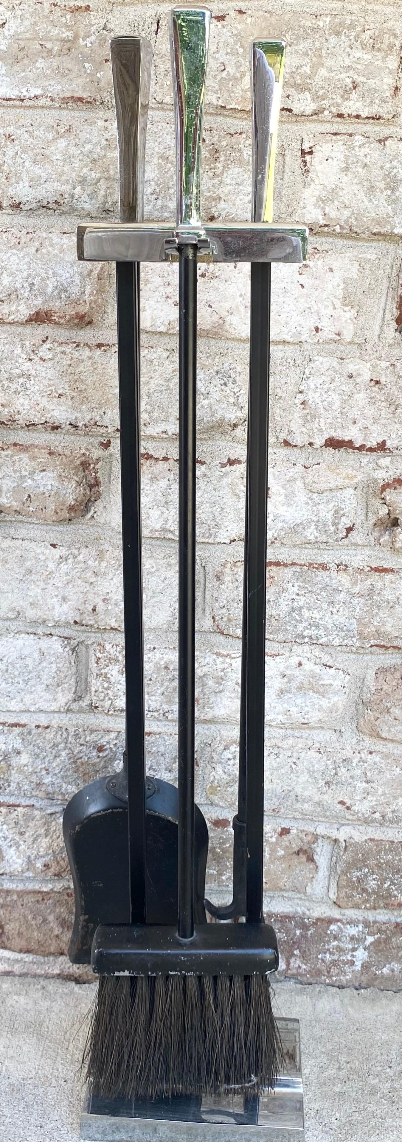Handsome set of iron and chrome fireplace tools.

The measurements for the stand is 26