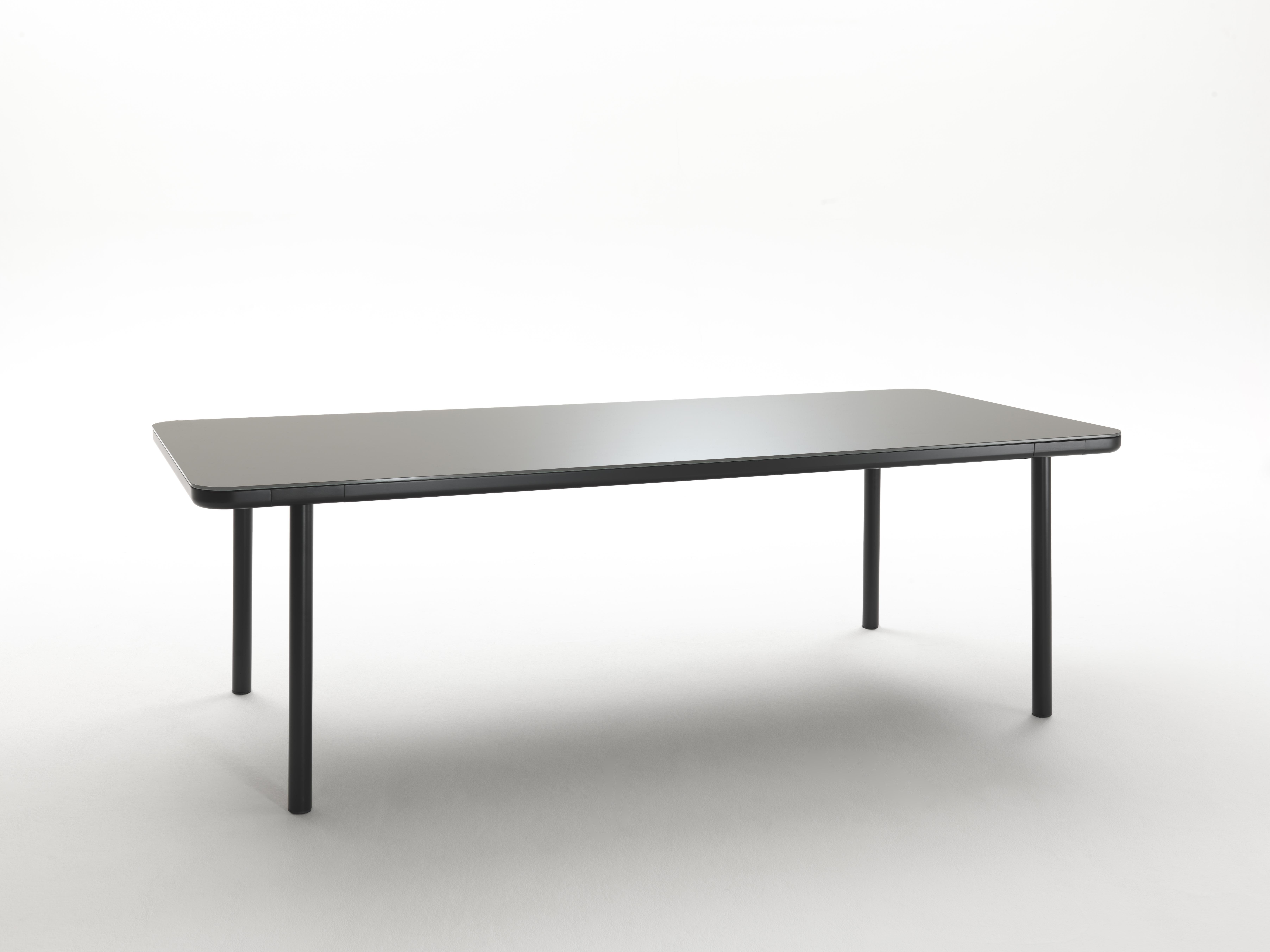Chromed point neuf table by Rodolfo Dordoni
Materials: Black chromed or black lacquered metal base with gray or matt black lacquered glass top resting on a black lacquered solid wood structure.
Technique: Lacquered metal, Chromed. 
Dimensions: D