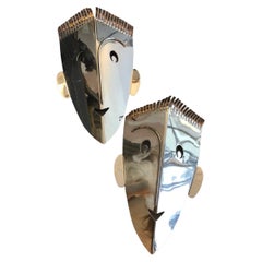 Chromed steel faces, Designer: Marcelo Peña, 2013