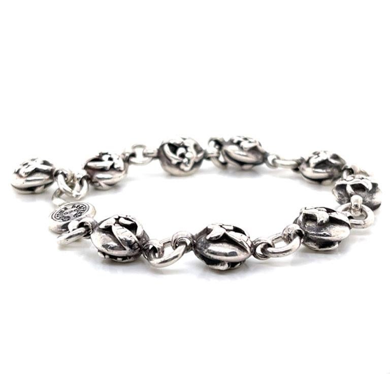Chromehearts Dragon bracelet in 925 Sterling Silver. This stunning bracelet features dragon heads on the links. The bracelet is secured with a hook clasp making it adjustable to hook into any of the circle links. The bracelet is approximately 9.50