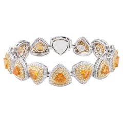 Granato mandarino di Chromia e diamante giallo e bianco in bracciale bicolore 18 carati 18,14 carati