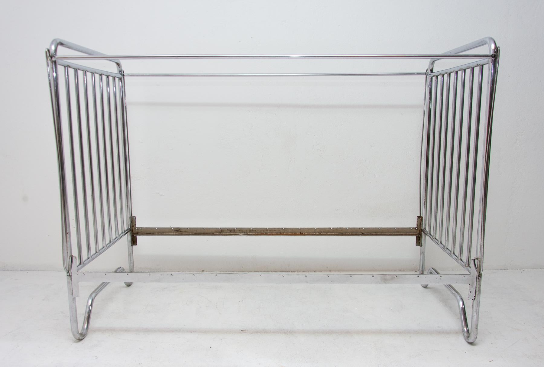 Chromium plated children bed from the Bauhaus period. Made in Bohemia, 1930s. A typical example of Bauhaus period in Central Europe. Chrome is in good vintage condition, just bears some signs of age and using.




  