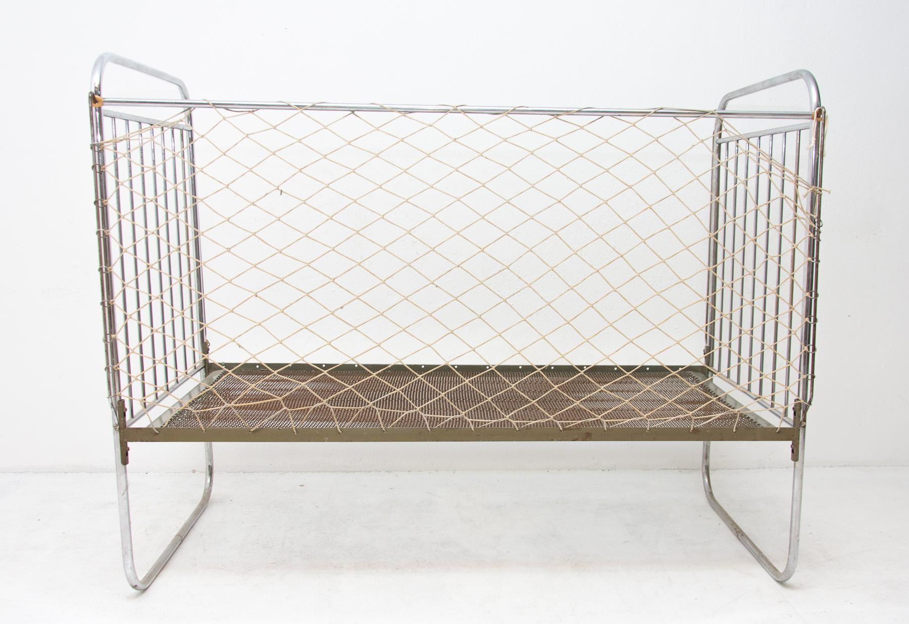 Chromium-plated children bed from the Bauhaus period. Made in Bohemia, 1930s. A typical example of Bauhaus period in Central Europe. Chrome is in good vintage condition, just bears some signs of age and using.



   