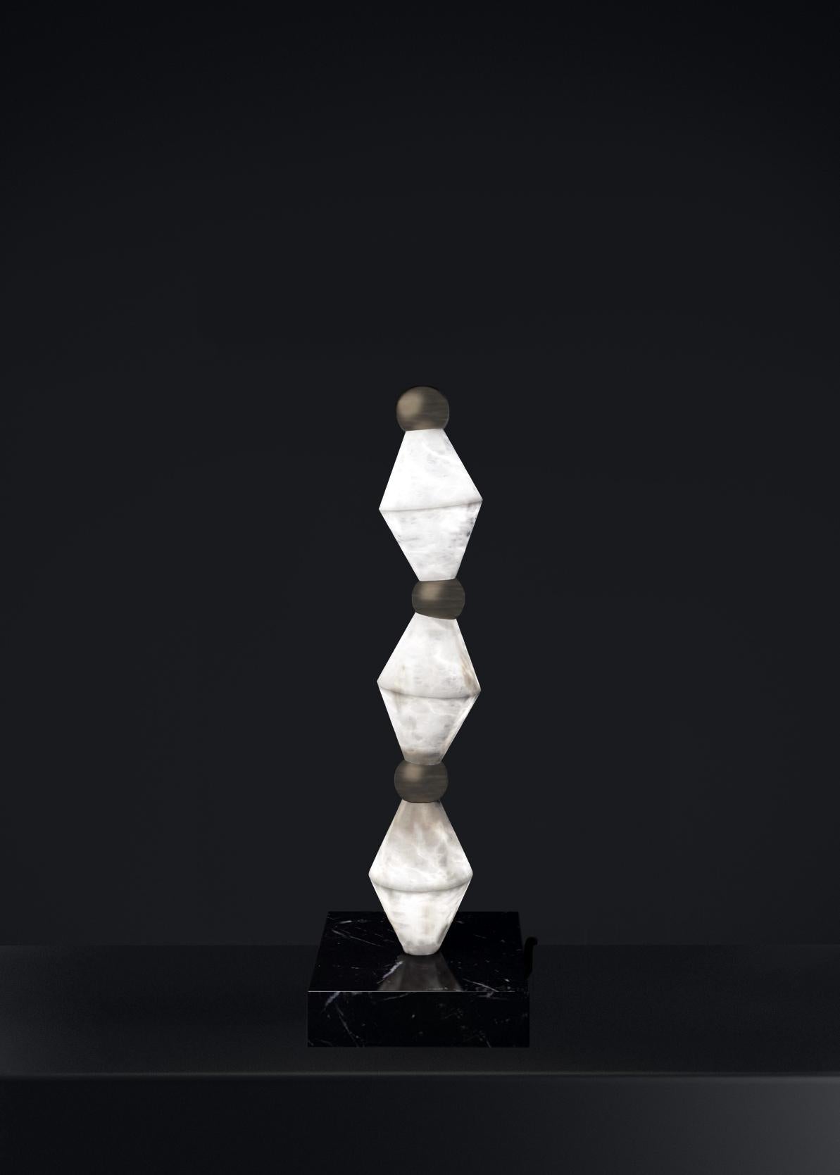 Chronos Brushed Burnished Table Lamp by Alabastro Italiano
Dimensions: D 15 x W 15 x H 71,5 cm.
Materials: White alabaster, marble and metal.

Available in different finishes: Shiny Silver, Bronze, Brushed Brass, Ruggine of Florence, Brushed