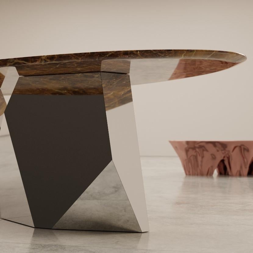 Chronos dining table by Duffy London
Dimensions: W 300 x D 140 x H 75 cm
Materials: marble, steel

Available in the following finishes:

Base sections: 
mirror-polished stainless steel in silver, rose-gold, gold, metallic blue or red
brushed