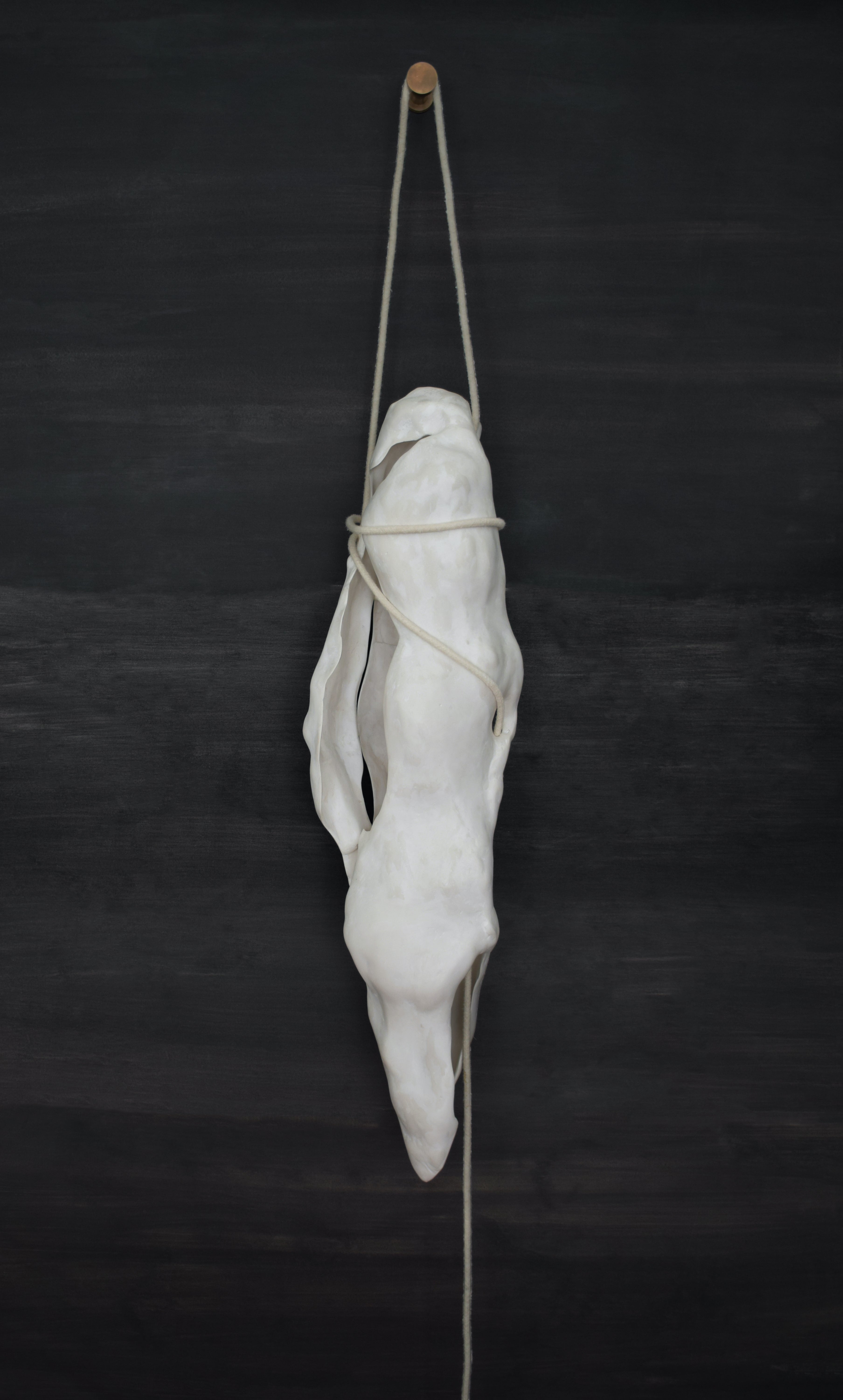 A permanent cast of temporary material. The shell is formed over an organic sculpture, broken and remade to delicately hold the light and illuminate the handwork and hollow marks of what used to be.
 
Sizes : 87 x 27 x 27cm
Year : 2022
Material